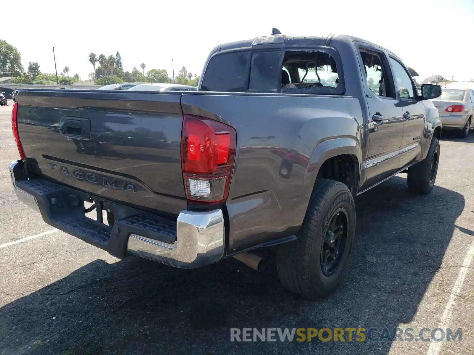 4 Photograph of a damaged car 5TFAX5GN7KX135906 TOYOTA TACOMA 2019