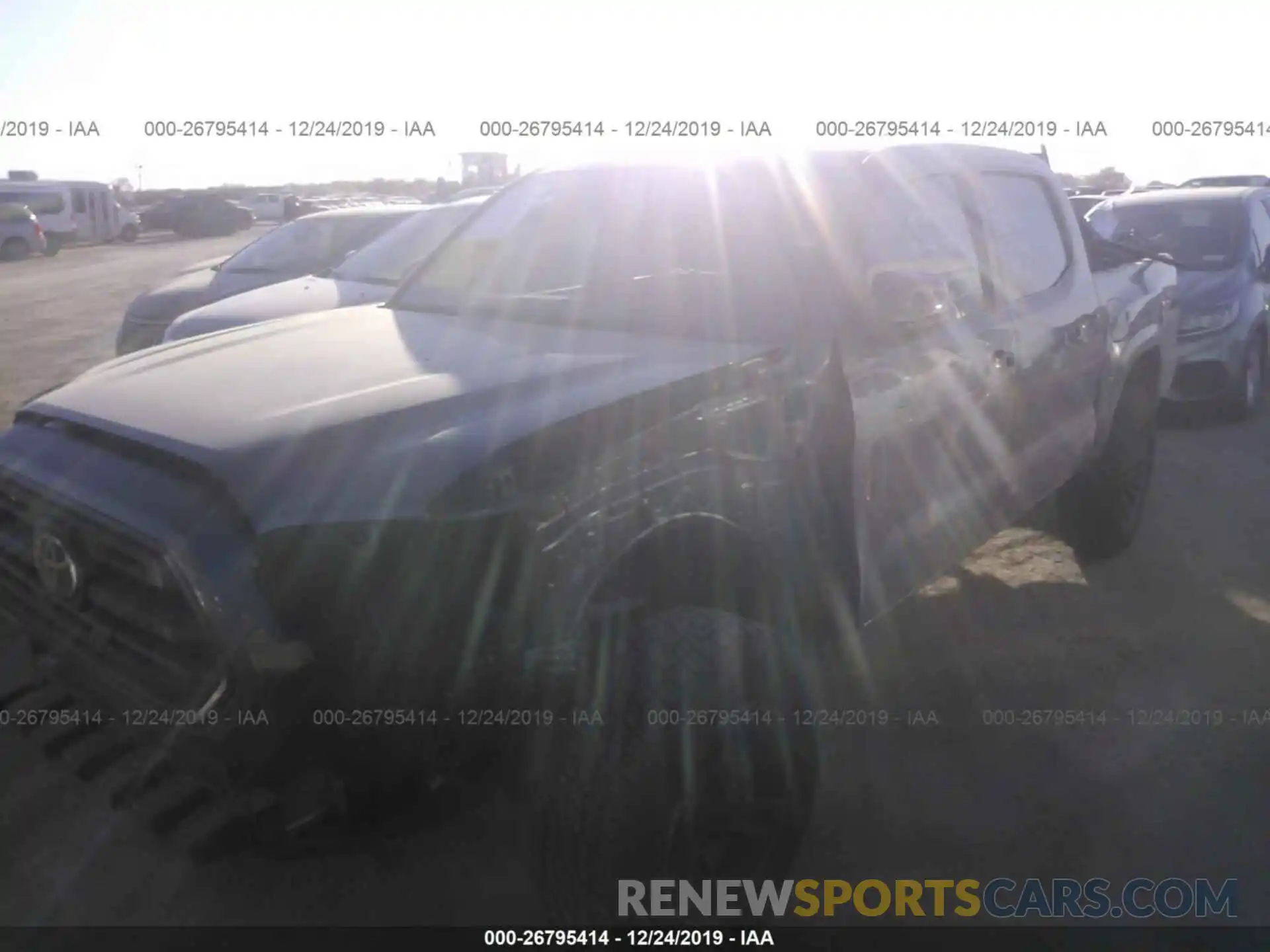 2 Photograph of a damaged car 5TFAX5GN7KX137347 TOYOTA TACOMA 2019