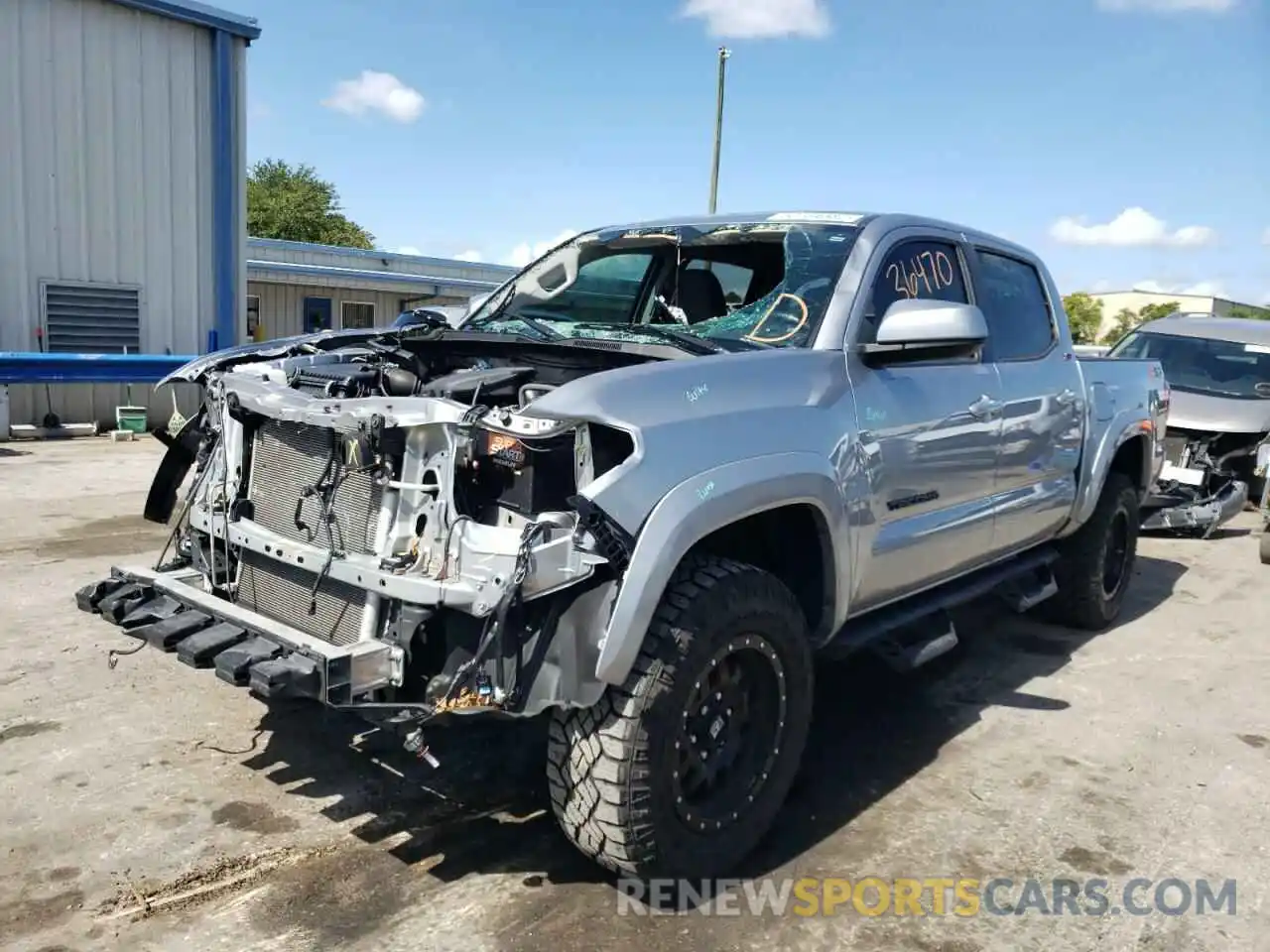 2 Photograph of a damaged car 5TFAX5GN7KX138269 TOYOTA TACOMA 2019