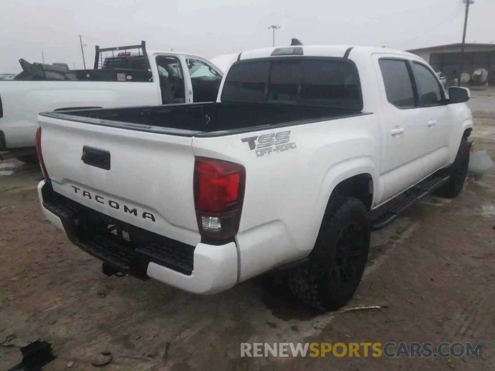 4 Photograph of a damaged car 5TFAX5GN7KX138496 TOYOTA TACOMA 2019