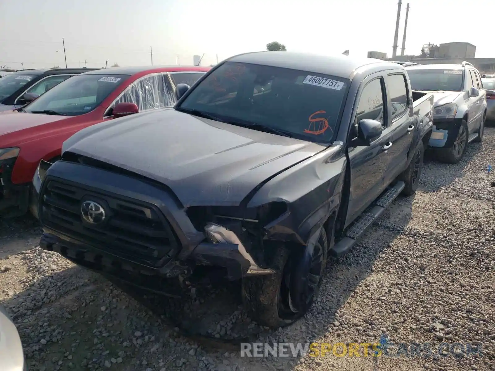 2 Photograph of a damaged car 5TFAX5GN7KX138675 TOYOTA TACOMA 2019