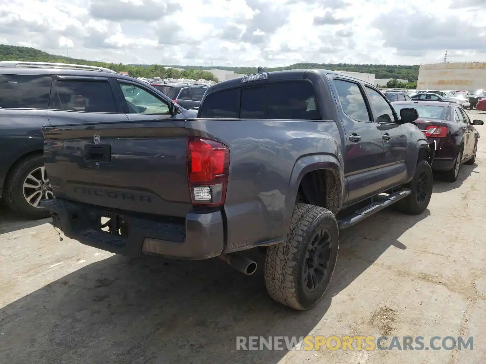 4 Photograph of a damaged car 5TFAX5GN7KX138675 TOYOTA TACOMA 2019