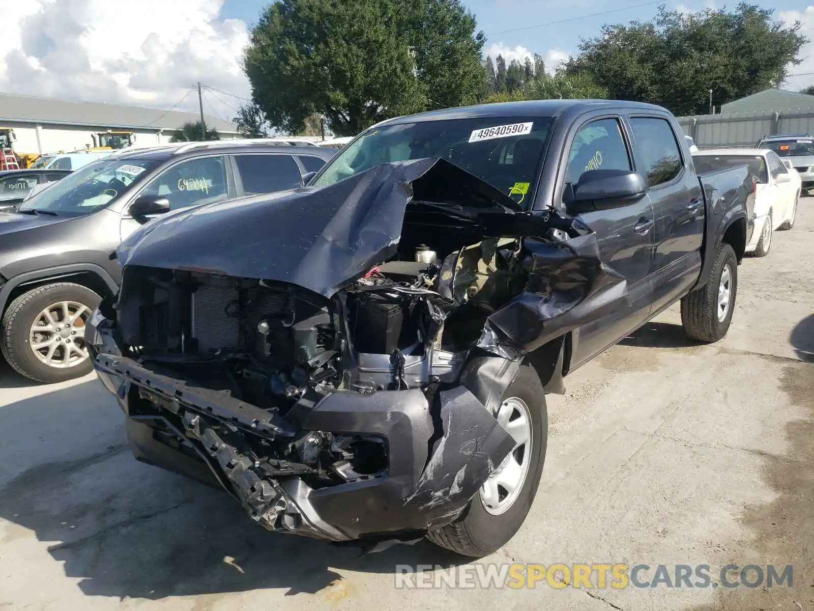 2 Photograph of a damaged car 5TFAX5GN7KX140183 TOYOTA TACOMA 2019