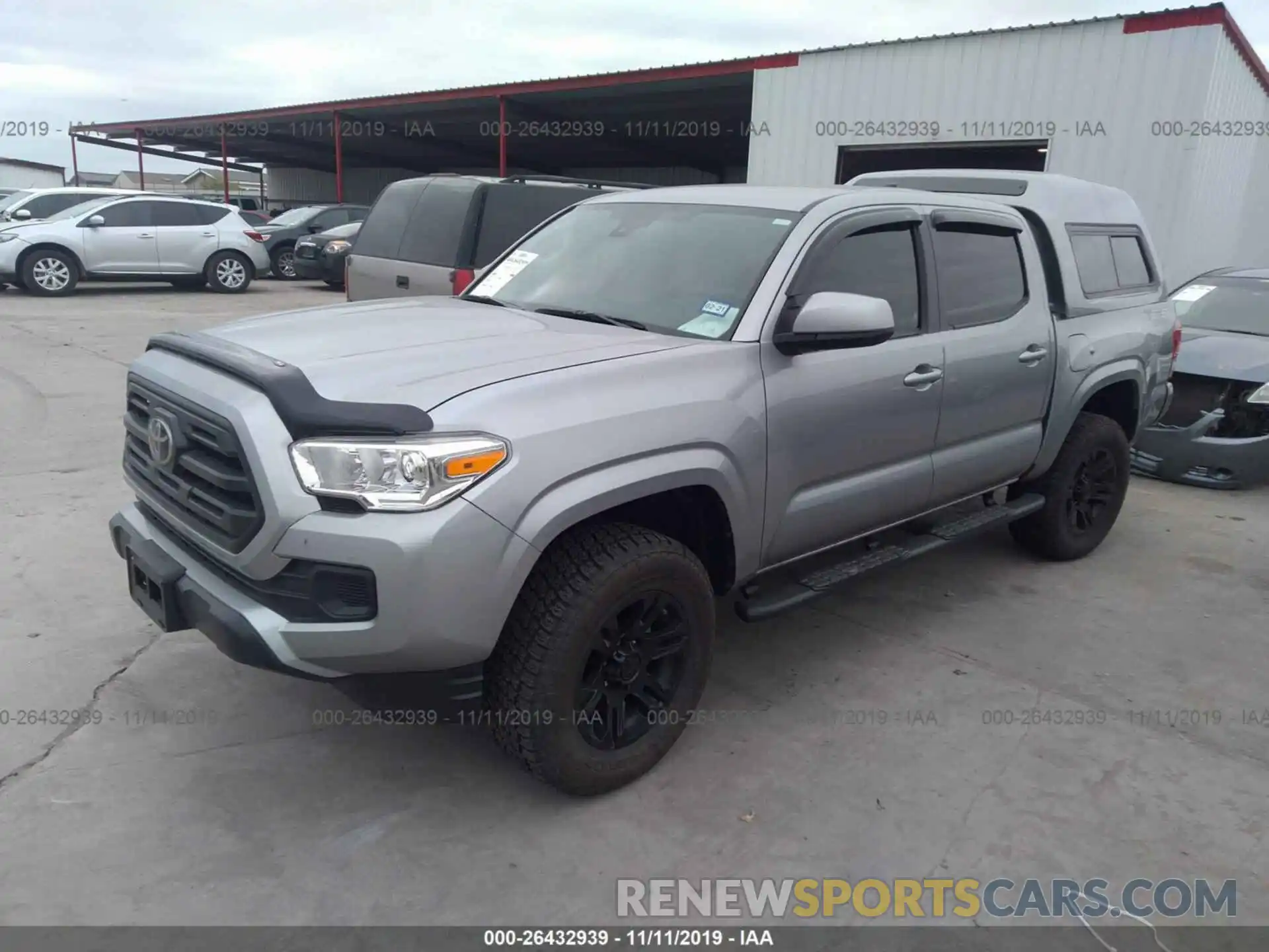 2 Photograph of a damaged car 5TFAX5GN7KX140300 TOYOTA TACOMA 2019