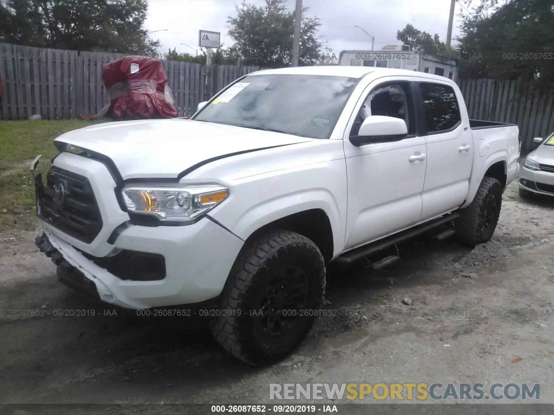 2 Photograph of a damaged car 5TFAX5GN7KX141270 TOYOTA TACOMA 2019