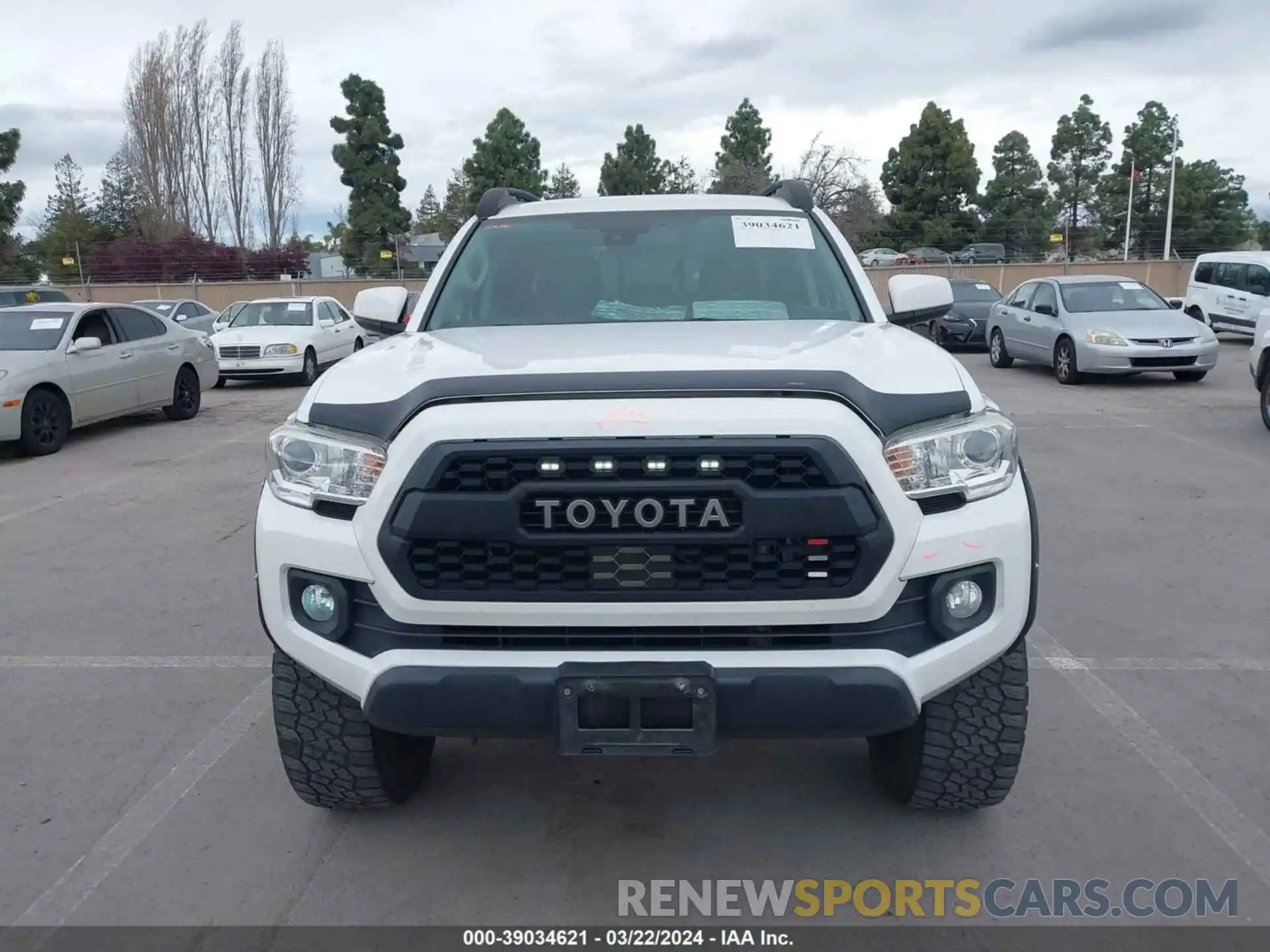 12 Photograph of a damaged car 5TFAX5GN7KX141592 TOYOTA TACOMA 2019