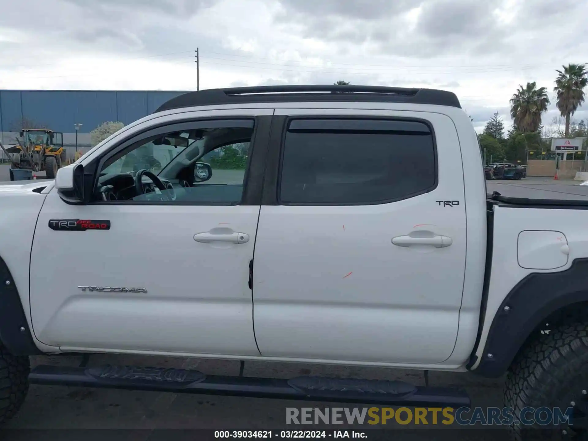 14 Photograph of a damaged car 5TFAX5GN7KX141592 TOYOTA TACOMA 2019