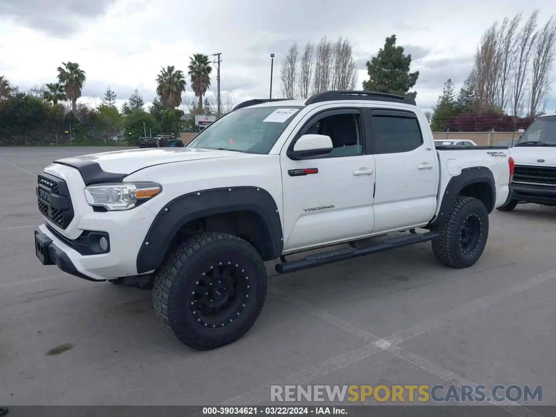 2 Photograph of a damaged car 5TFAX5GN7KX141592 TOYOTA TACOMA 2019