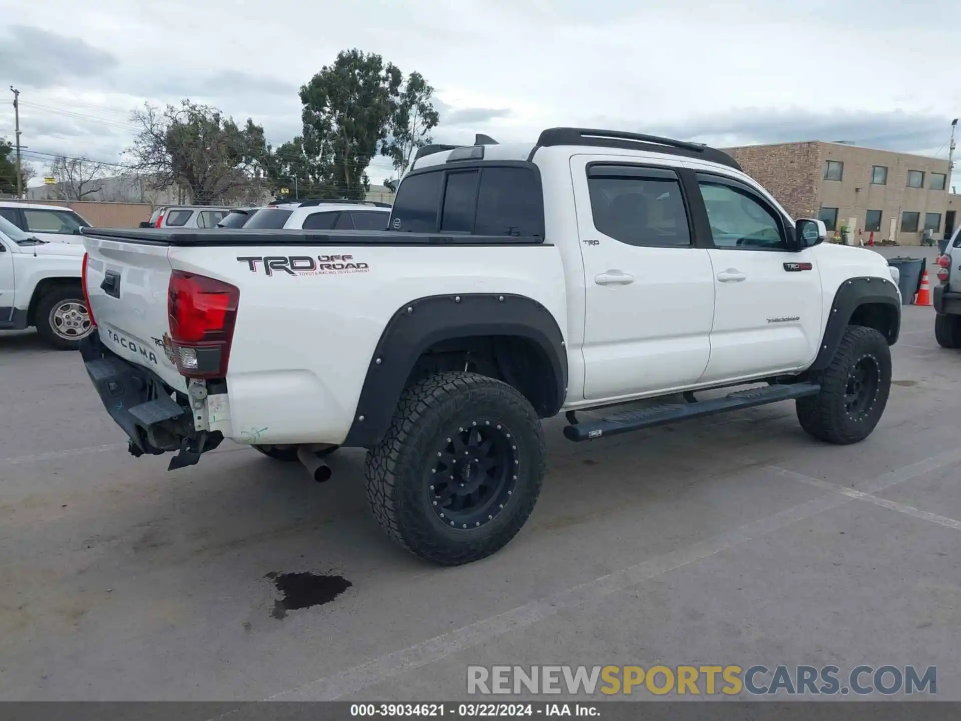 4 Photograph of a damaged car 5TFAX5GN7KX141592 TOYOTA TACOMA 2019