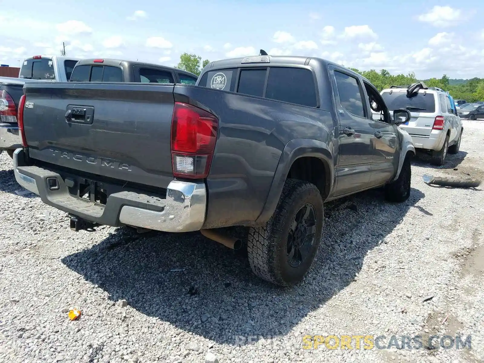 4 Photograph of a damaged car 5TFAX5GN7KX141690 TOYOTA TACOMA 2019