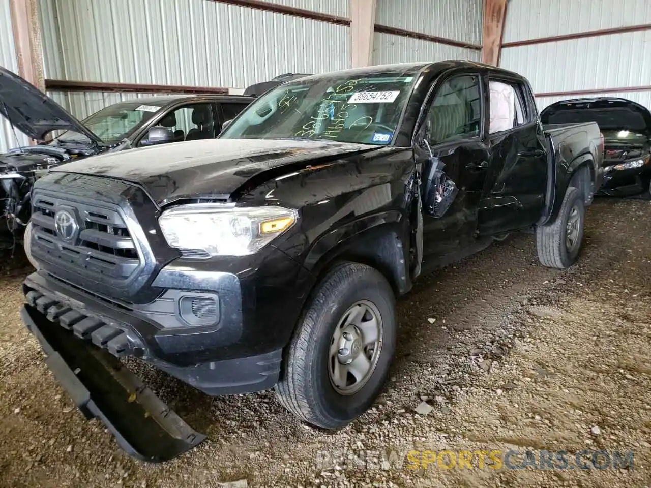 2 Photograph of a damaged car 5TFAX5GN7KX146405 TOYOTA TACOMA 2019