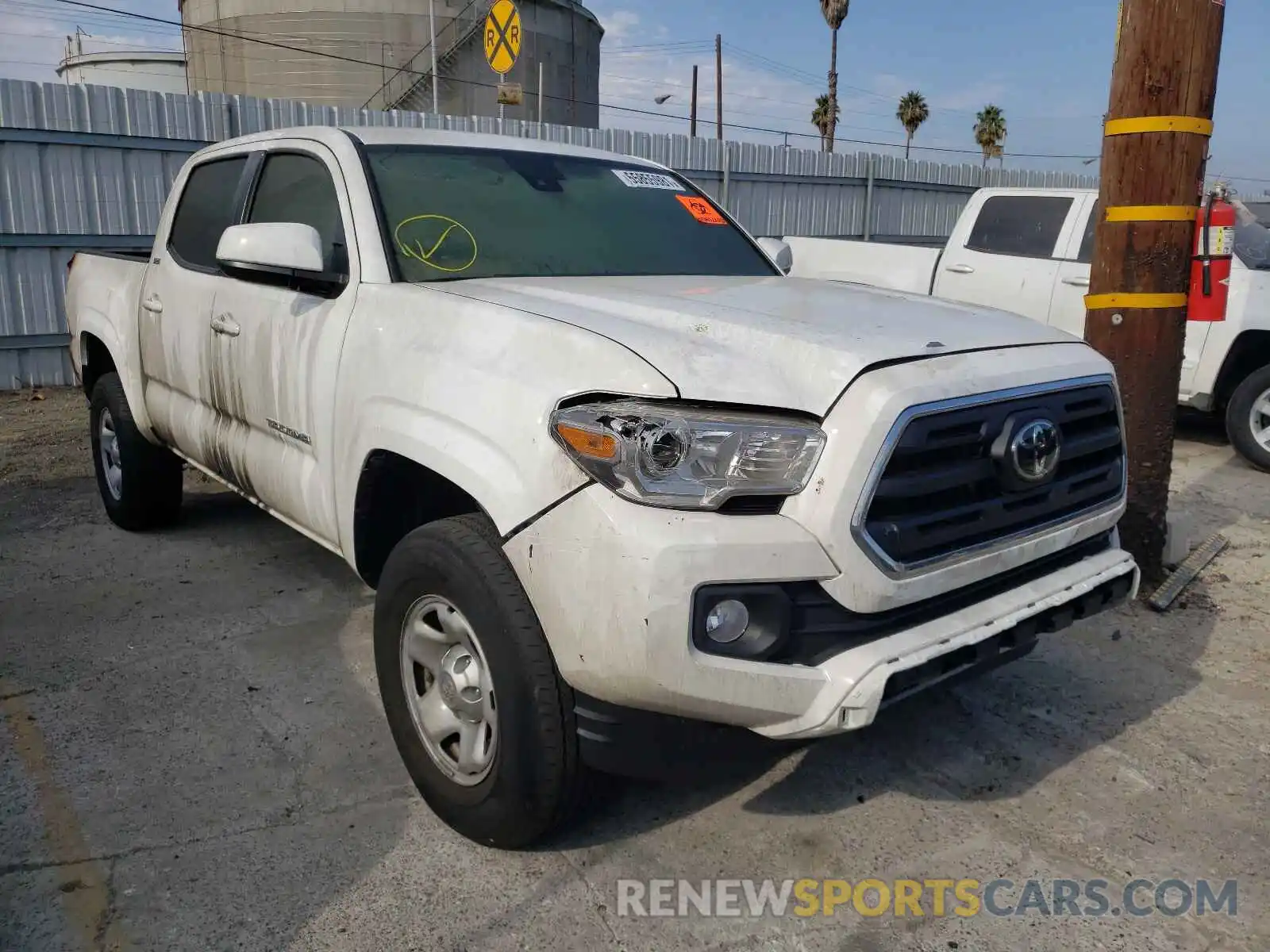 1 Photograph of a damaged car 5TFAX5GN7KX147473 TOYOTA TACOMA 2019