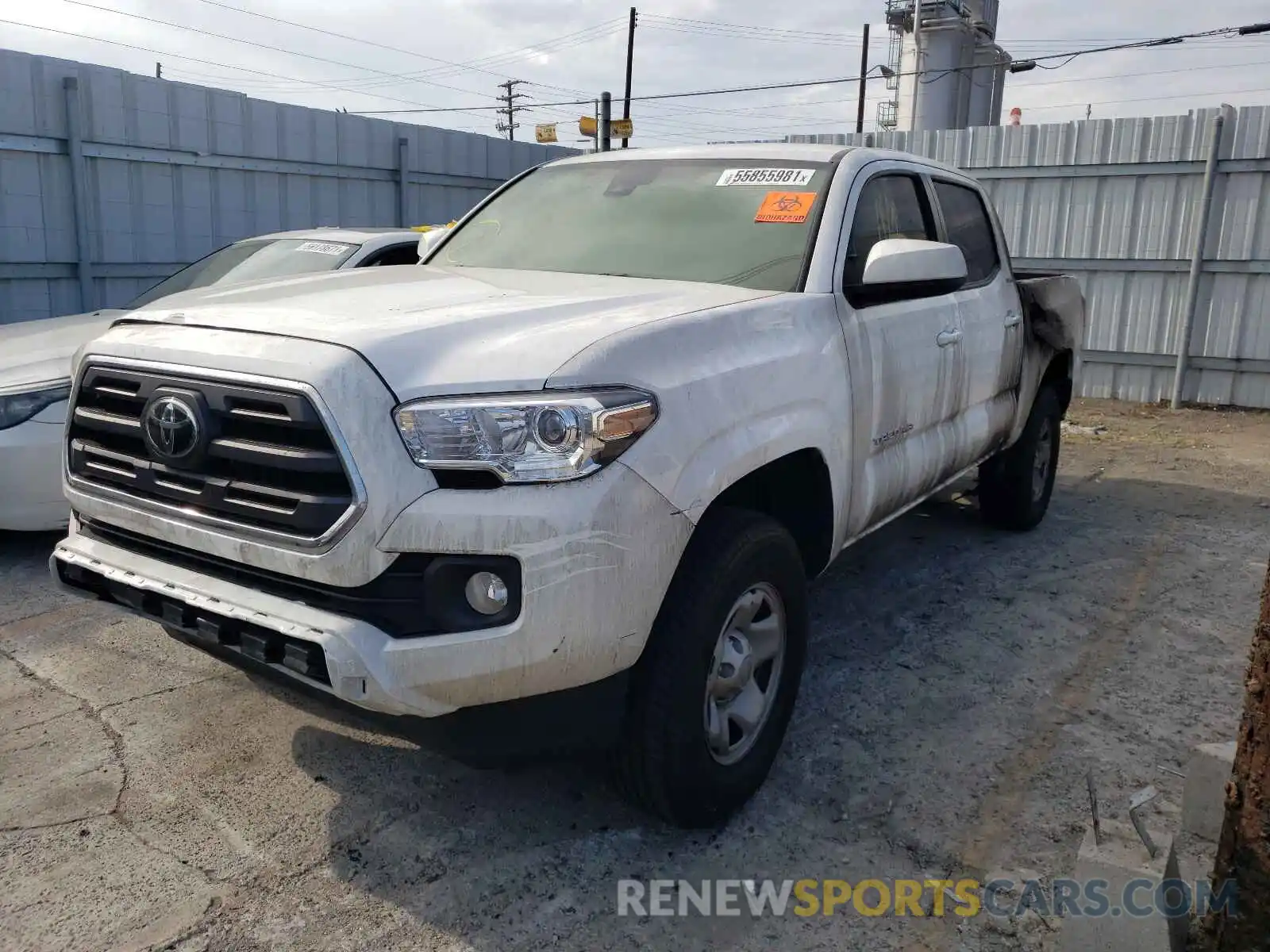 2 Photograph of a damaged car 5TFAX5GN7KX147473 TOYOTA TACOMA 2019