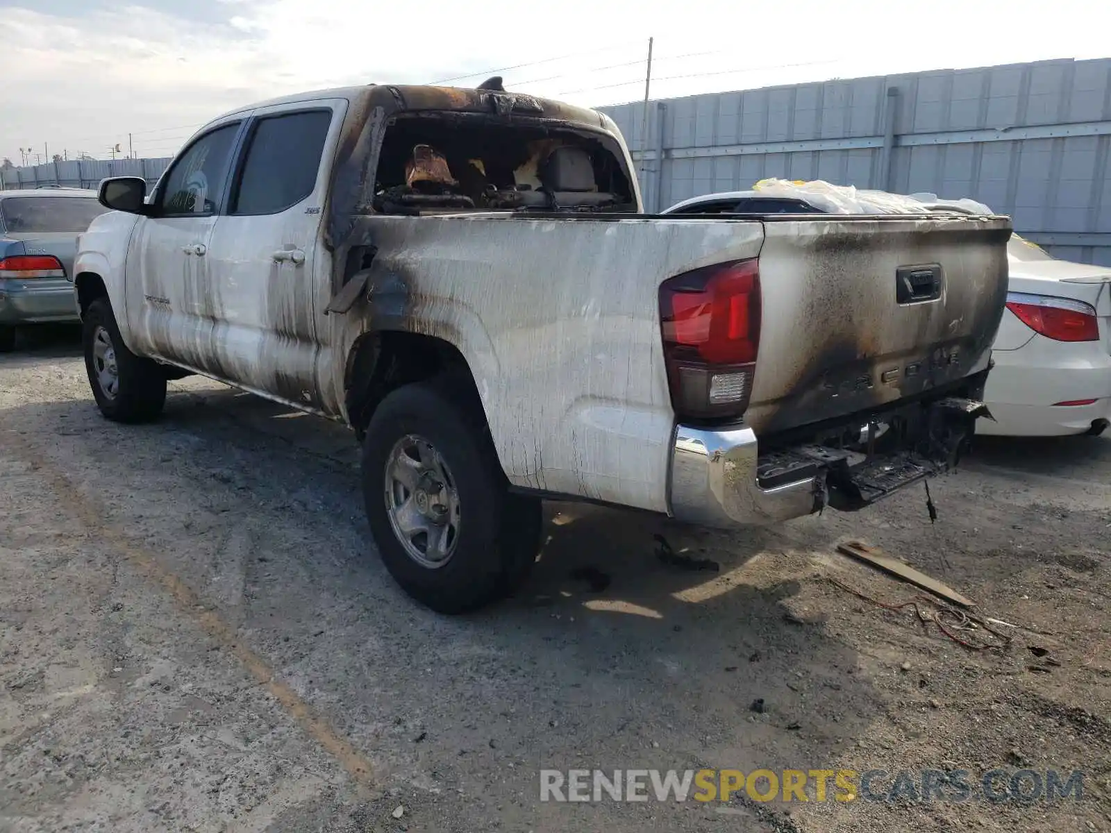 3 Photograph of a damaged car 5TFAX5GN7KX147473 TOYOTA TACOMA 2019