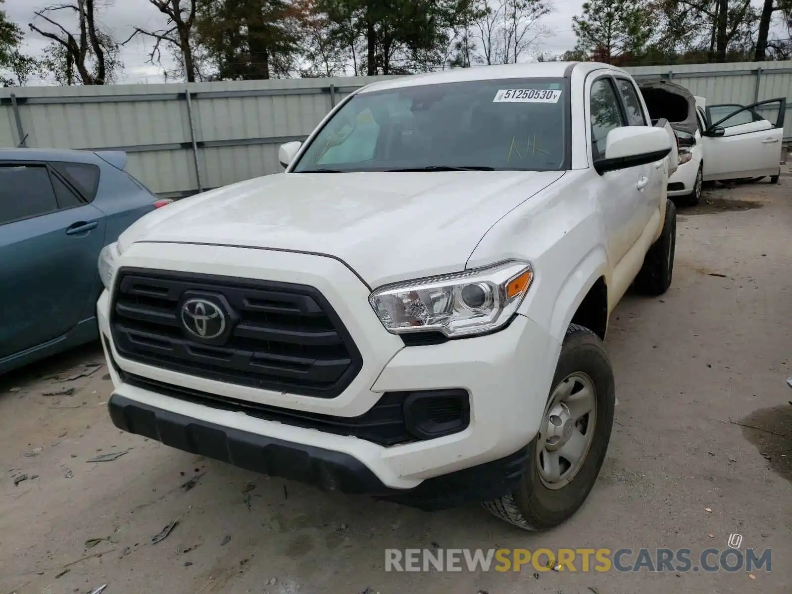 2 Photograph of a damaged car 5TFAX5GN7KX147814 TOYOTA TACOMA 2019