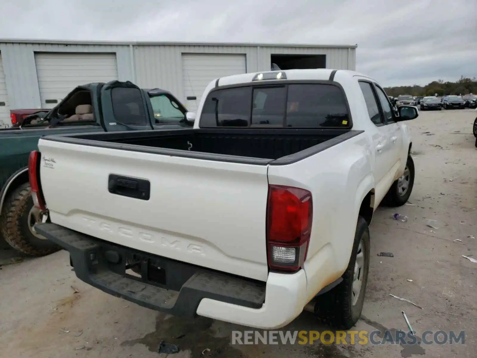 4 Photograph of a damaged car 5TFAX5GN7KX147814 TOYOTA TACOMA 2019