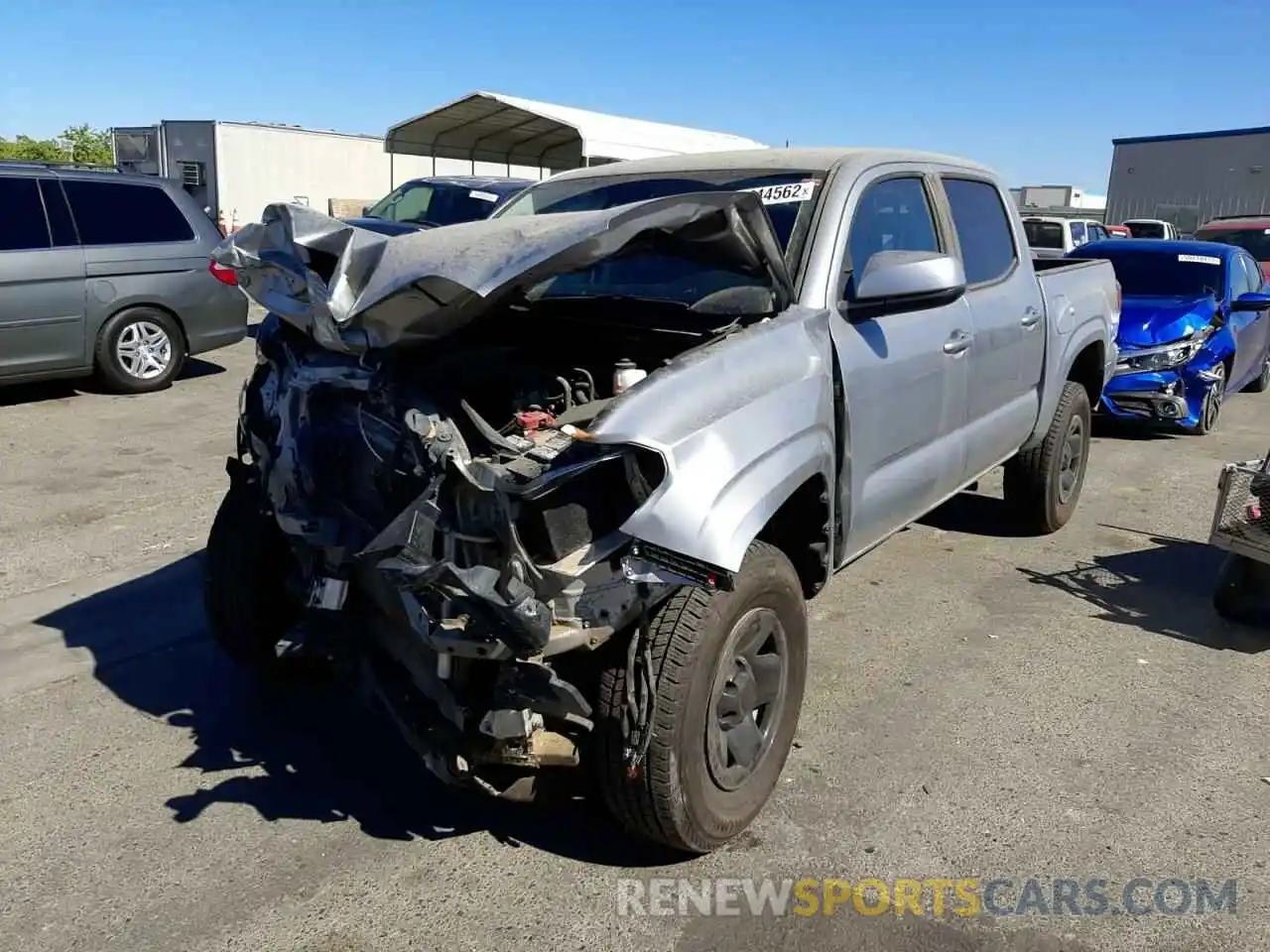 2 Photograph of a damaged car 5TFAX5GN7KX148896 TOYOTA TACOMA 2019