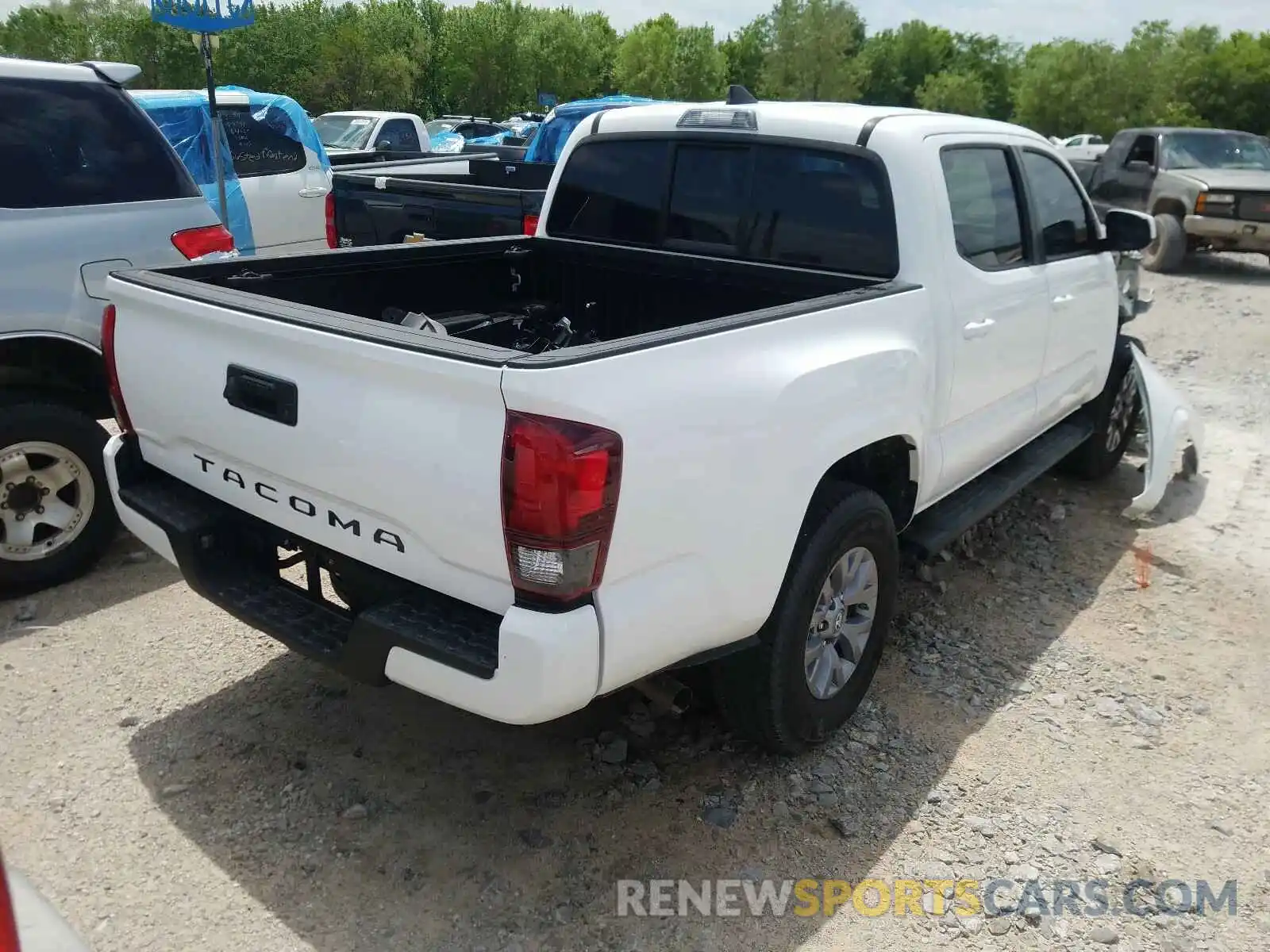 4 Photograph of a damaged car 5TFAX5GN7KX149126 TOYOTA TACOMA 2019