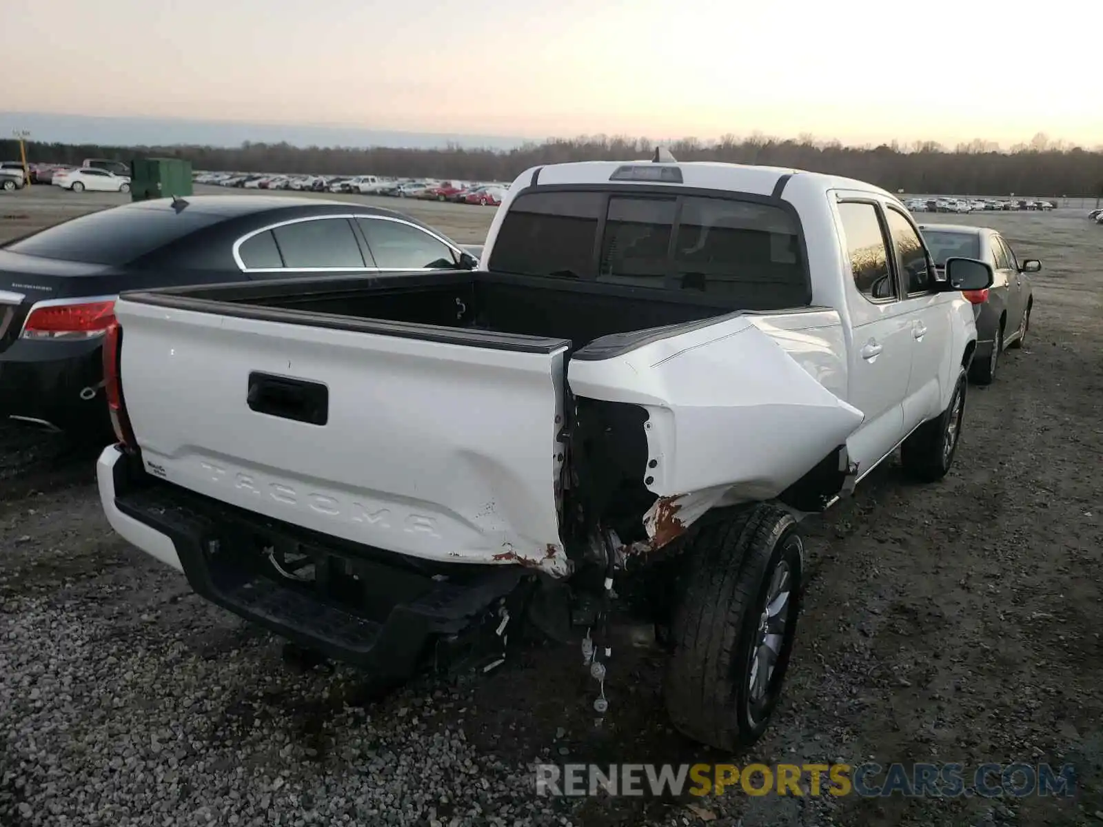 4 Photograph of a damaged car 5TFAX5GN7KX152320 TOYOTA TACOMA 2019