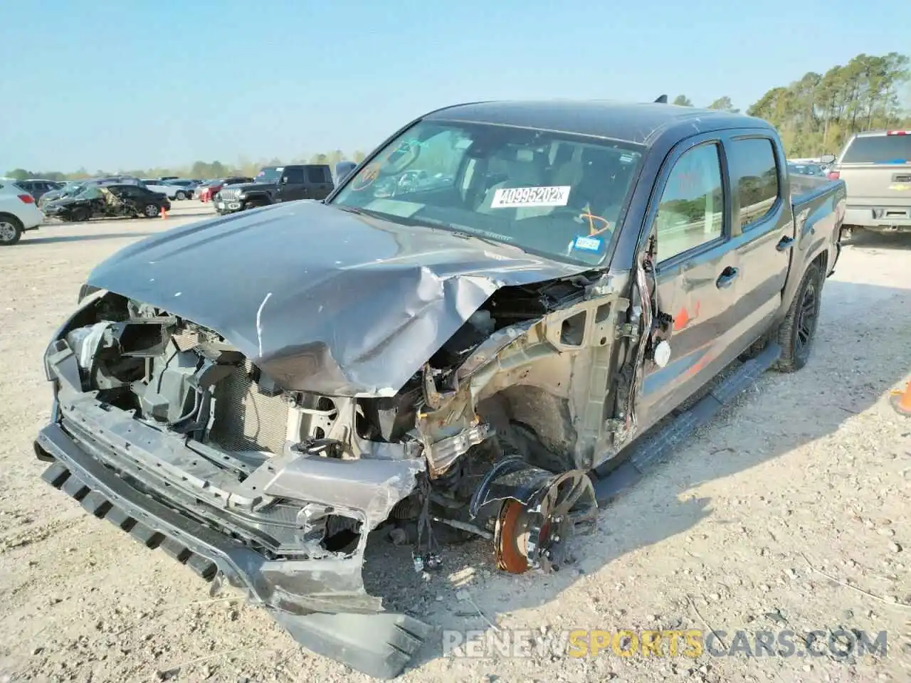 2 Photograph of a damaged car 5TFAX5GN7KX159400 TOYOTA TACOMA 2019