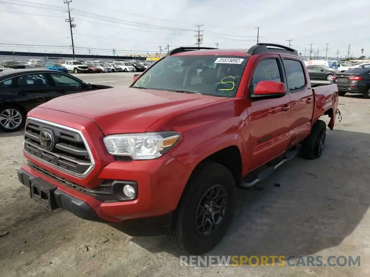 2 Photograph of a damaged car 5TFAX5GN7KX162247 TOYOTA TACOMA 2019