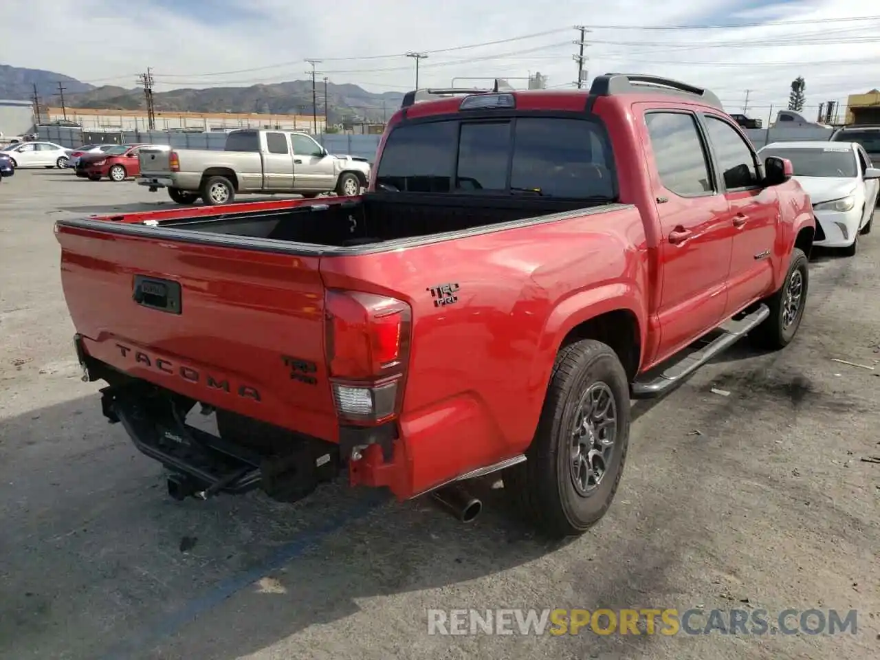 4 Photograph of a damaged car 5TFAX5GN7KX162247 TOYOTA TACOMA 2019