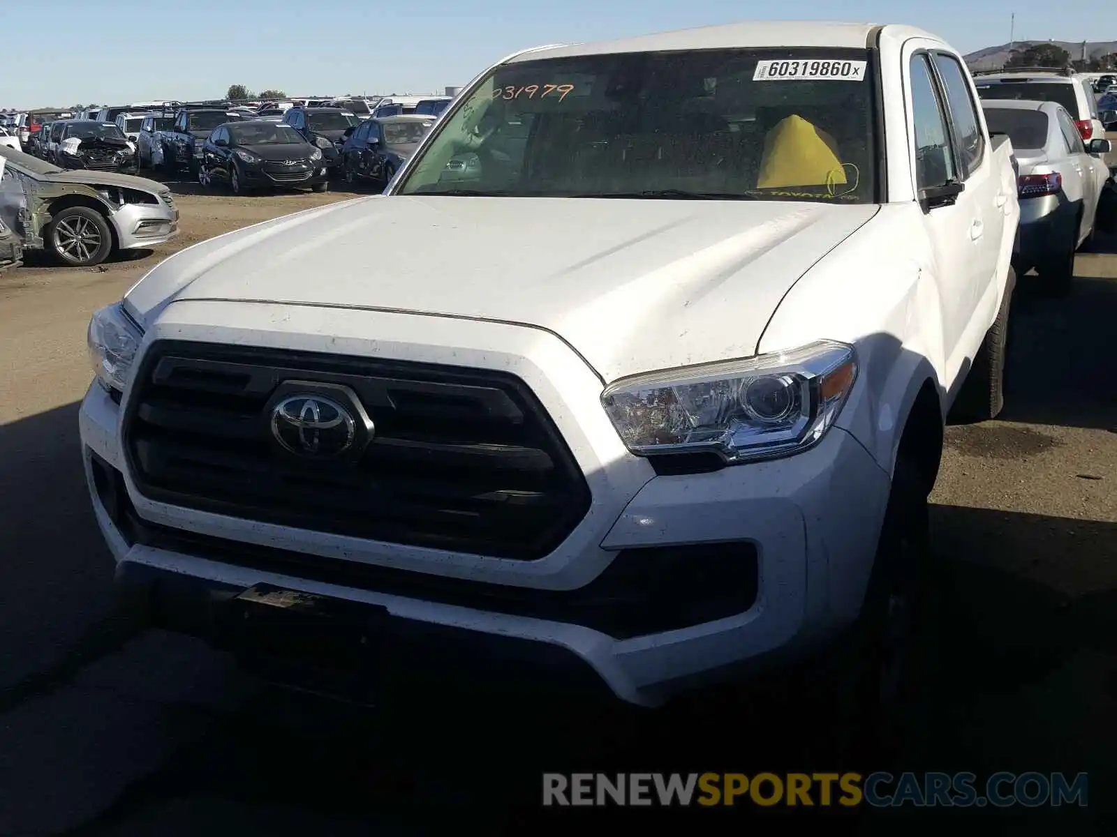 2 Photograph of a damaged car 5TFAX5GN7KX164029 TOYOTA TACOMA 2019