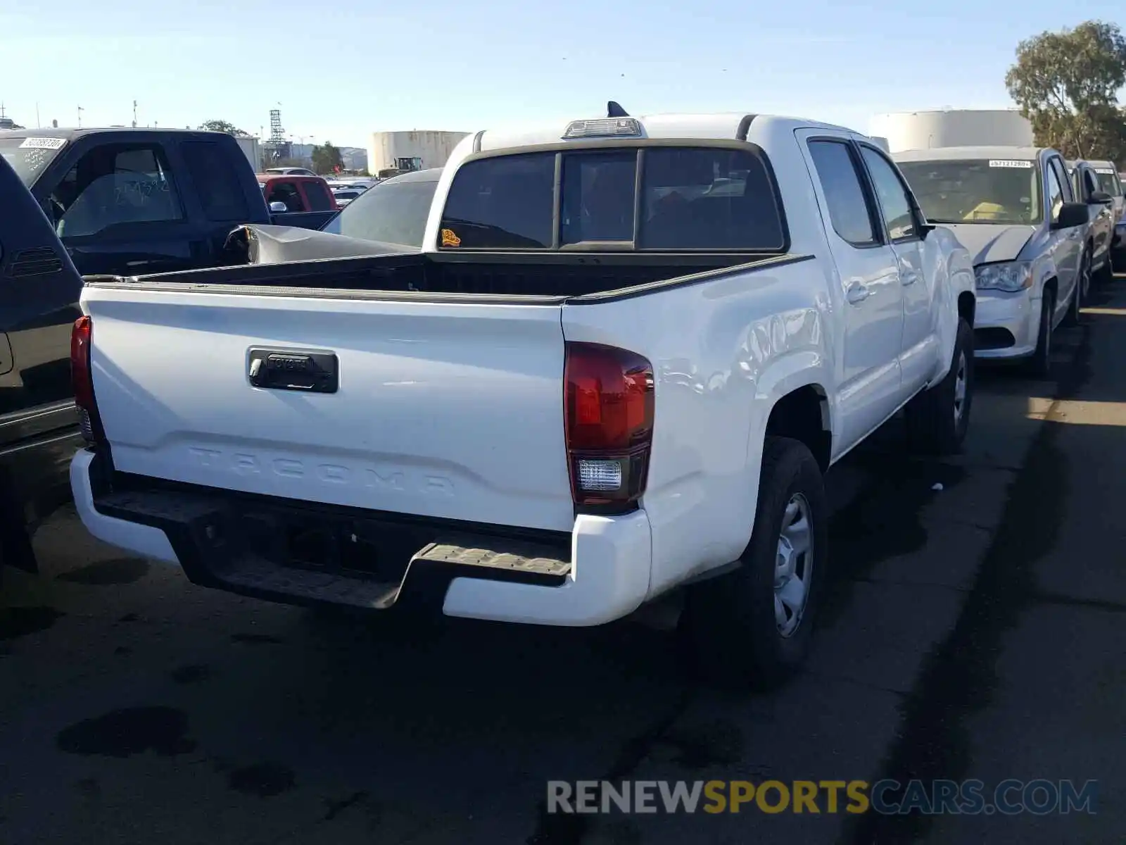 4 Photograph of a damaged car 5TFAX5GN7KX164029 TOYOTA TACOMA 2019