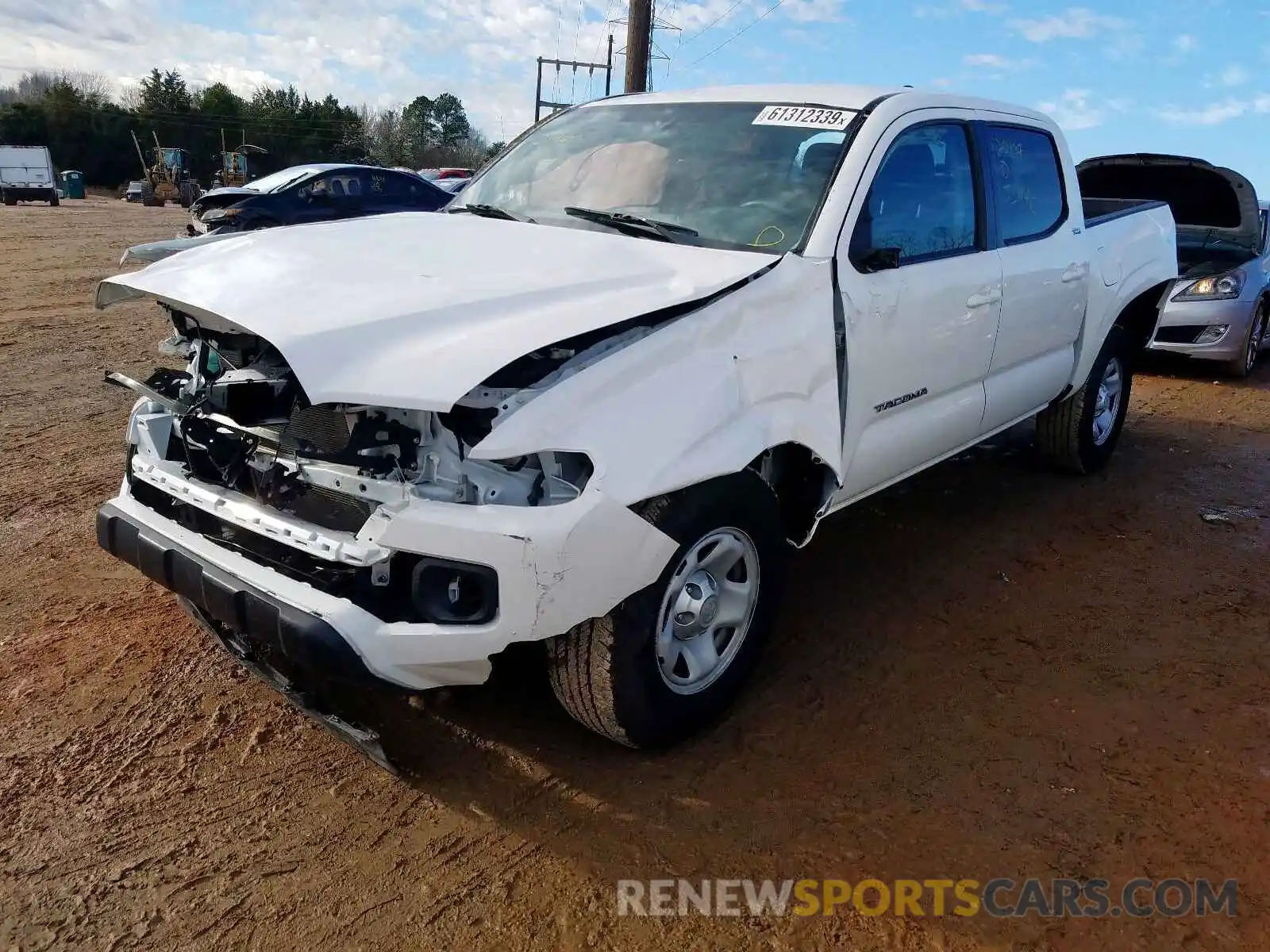 2 Photograph of a damaged car 5TFAX5GN8KX132321 TOYOTA TACOMA 2019