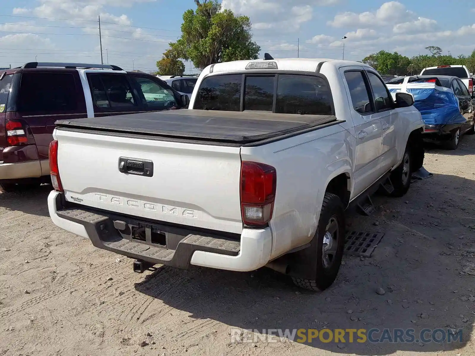 4 Photograph of a damaged car 5TFAX5GN8KX133310 TOYOTA TACOMA 2019