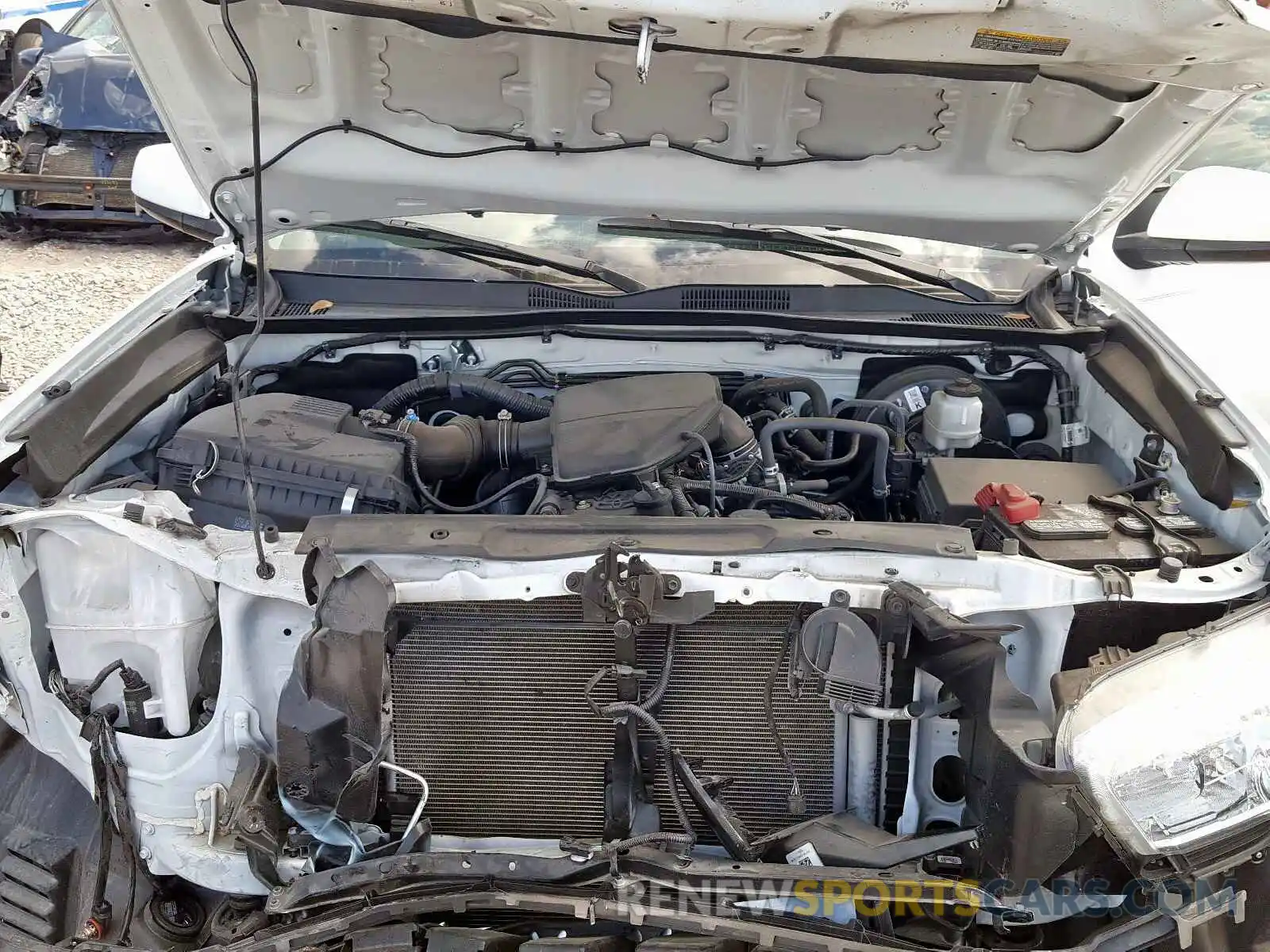 7 Photograph of a damaged car 5TFAX5GN8KX133310 TOYOTA TACOMA 2019