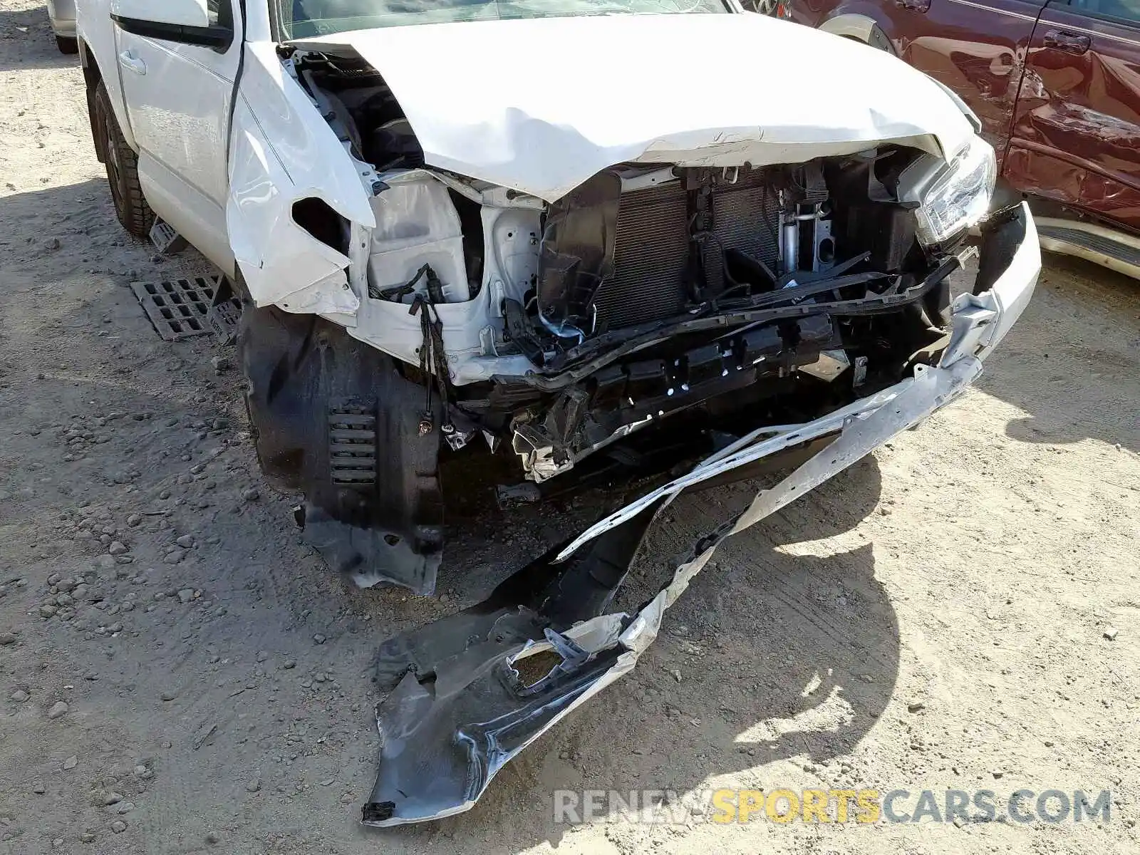 9 Photograph of a damaged car 5TFAX5GN8KX133310 TOYOTA TACOMA 2019