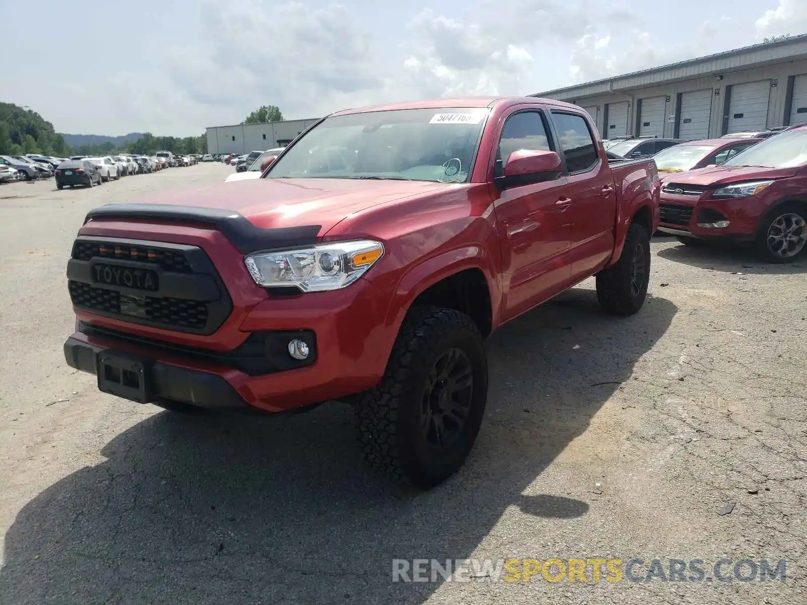 2 Photograph of a damaged car 5TFAX5GN8KX133808 TOYOTA TACOMA 2019