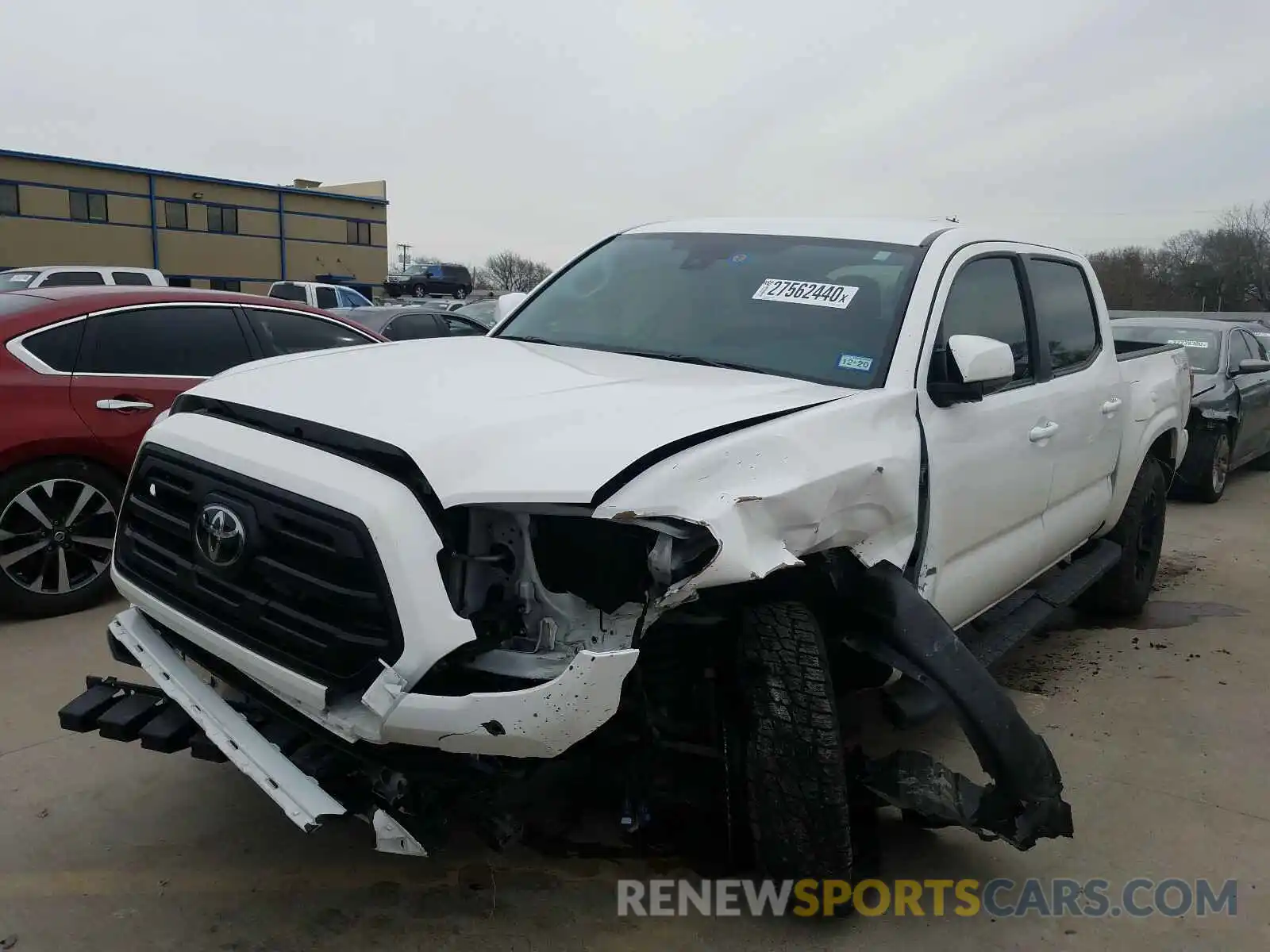 2 Photograph of a damaged car 5TFAX5GN8KX134781 TOYOTA TACOMA 2019