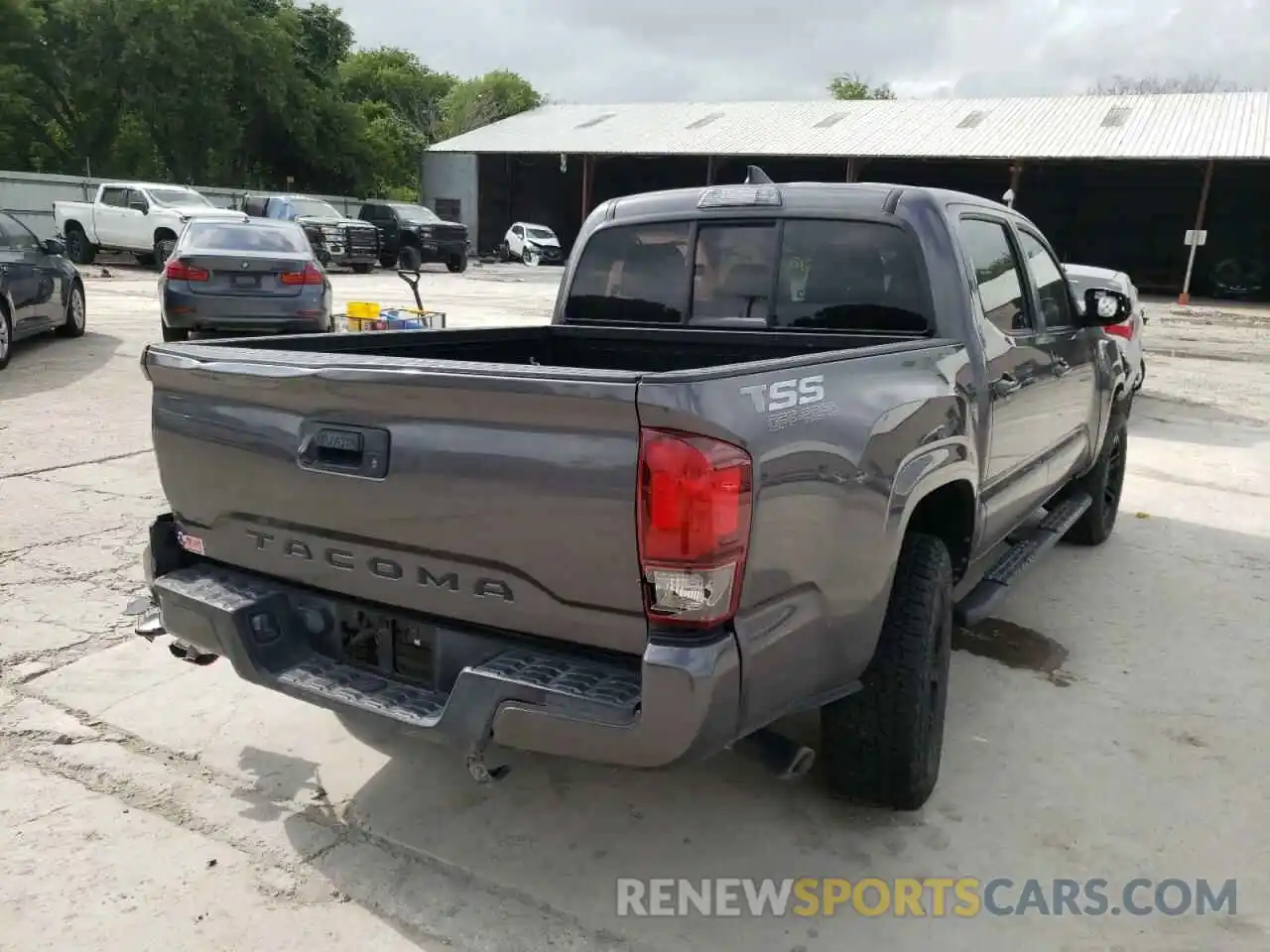 4 Photograph of a damaged car 5TFAX5GN8KX135557 TOYOTA TACOMA 2019