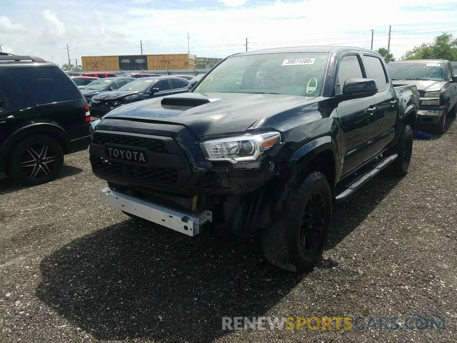 2 Photograph of a damaged car 5TFAX5GN8KX135610 TOYOTA TACOMA 2019