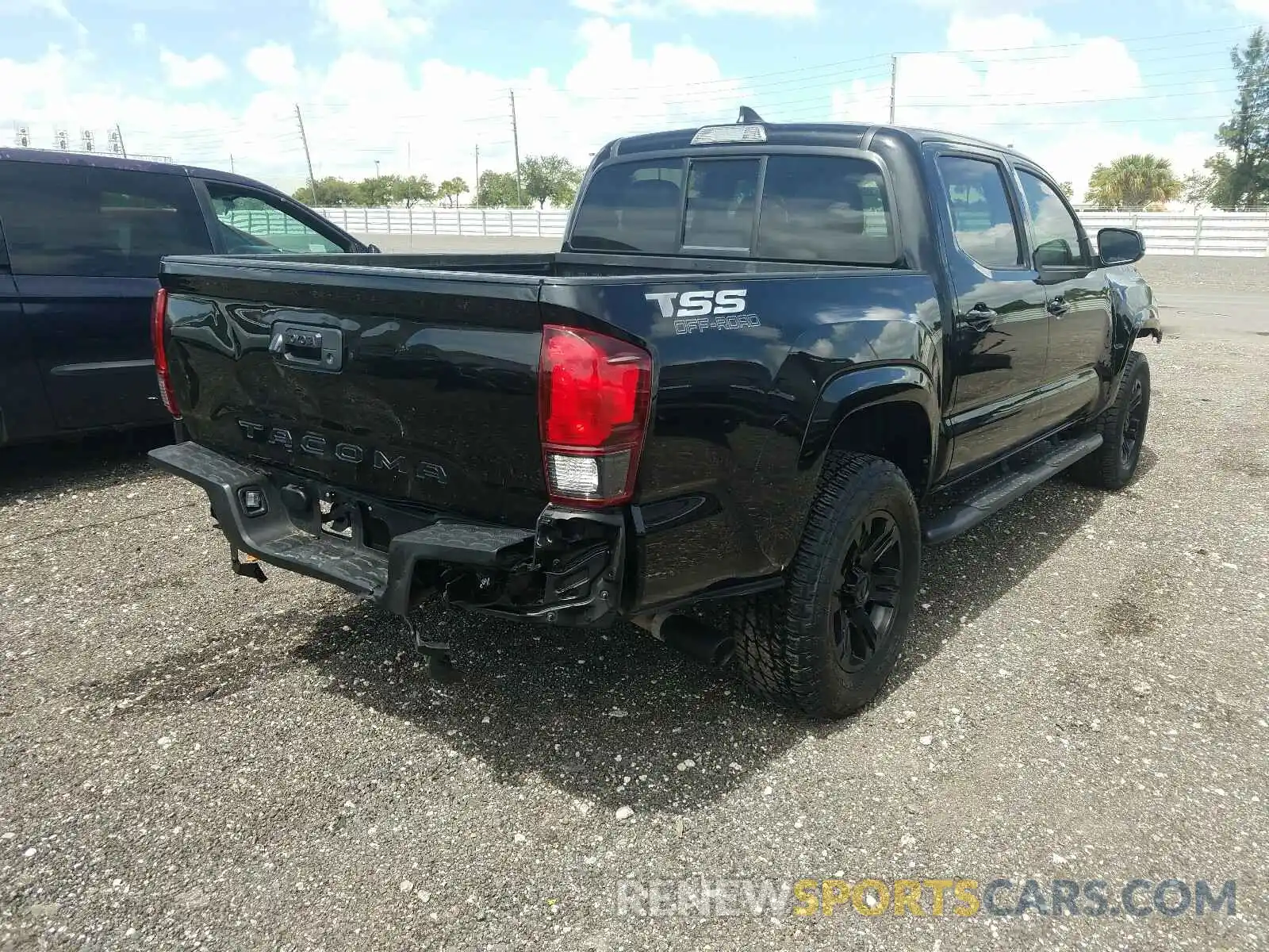 4 Photograph of a damaged car 5TFAX5GN8KX135610 TOYOTA TACOMA 2019