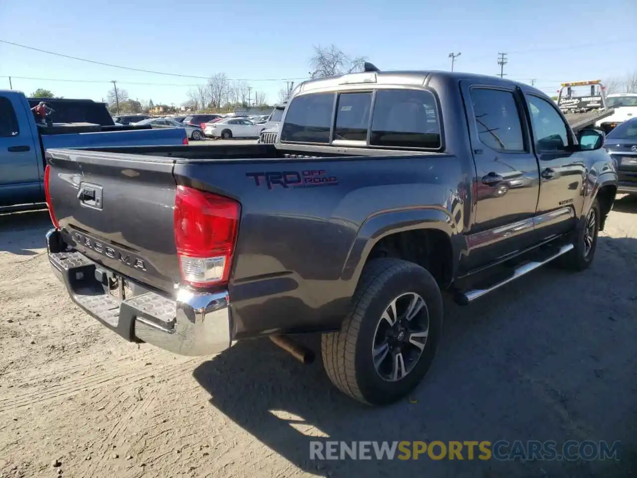 4 Photograph of a damaged car 5TFAX5GN8KX137101 TOYOTA TACOMA 2019