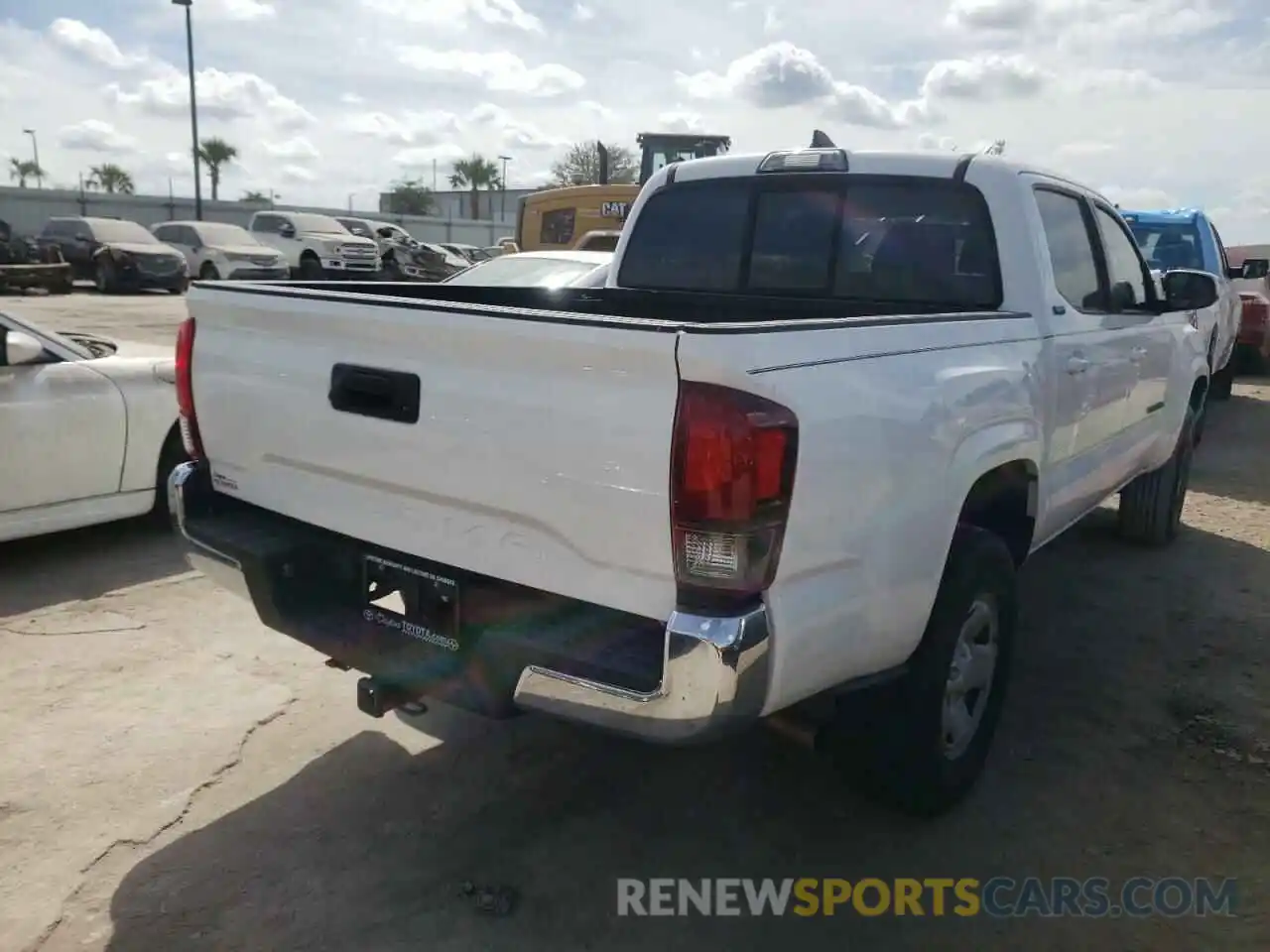 4 Photograph of a damaged car 5TFAX5GN8KX137938 TOYOTA TACOMA 2019