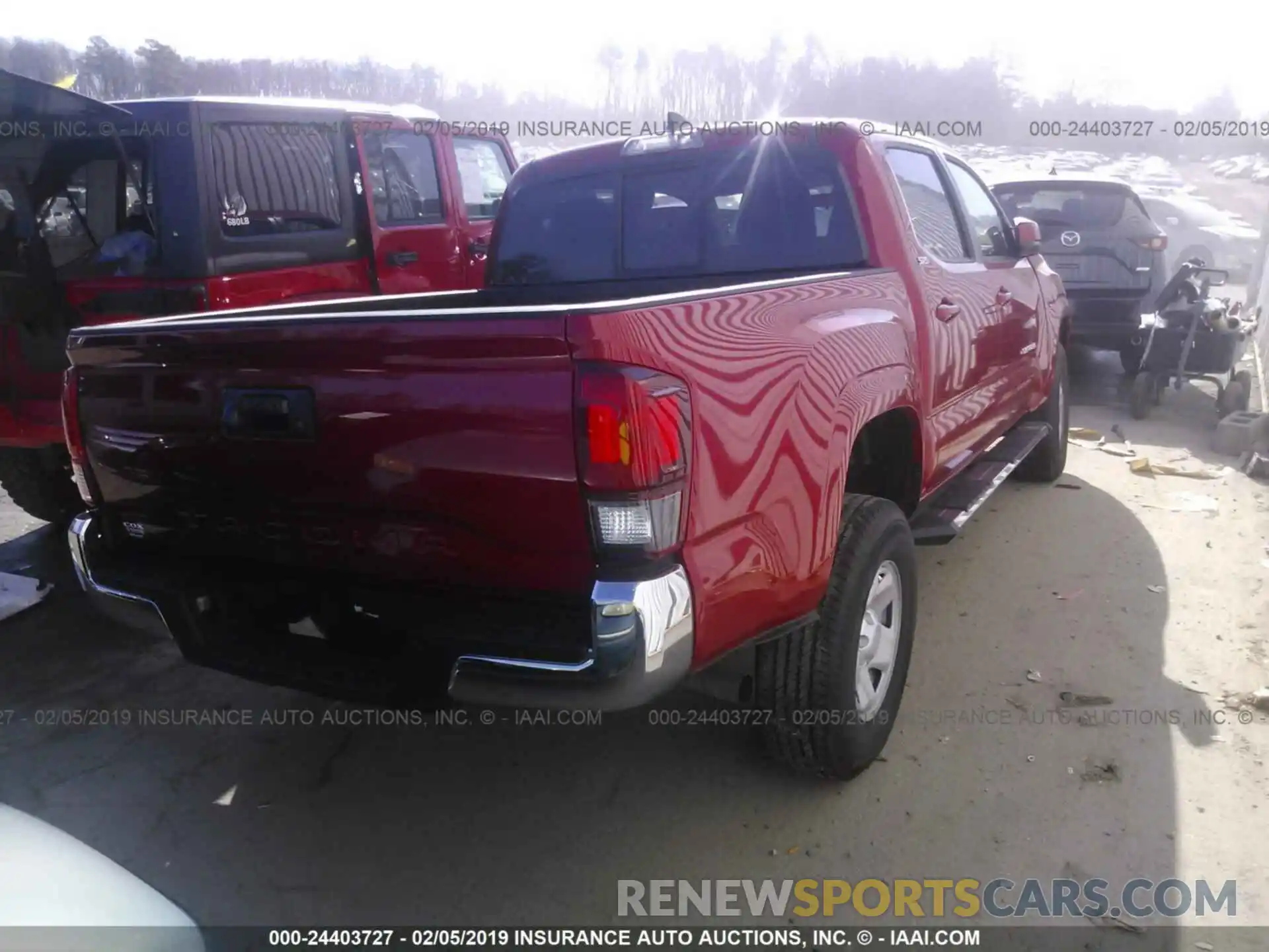 4 Photograph of a damaged car 5TFAX5GN8KX137972 TOYOTA TACOMA 2019