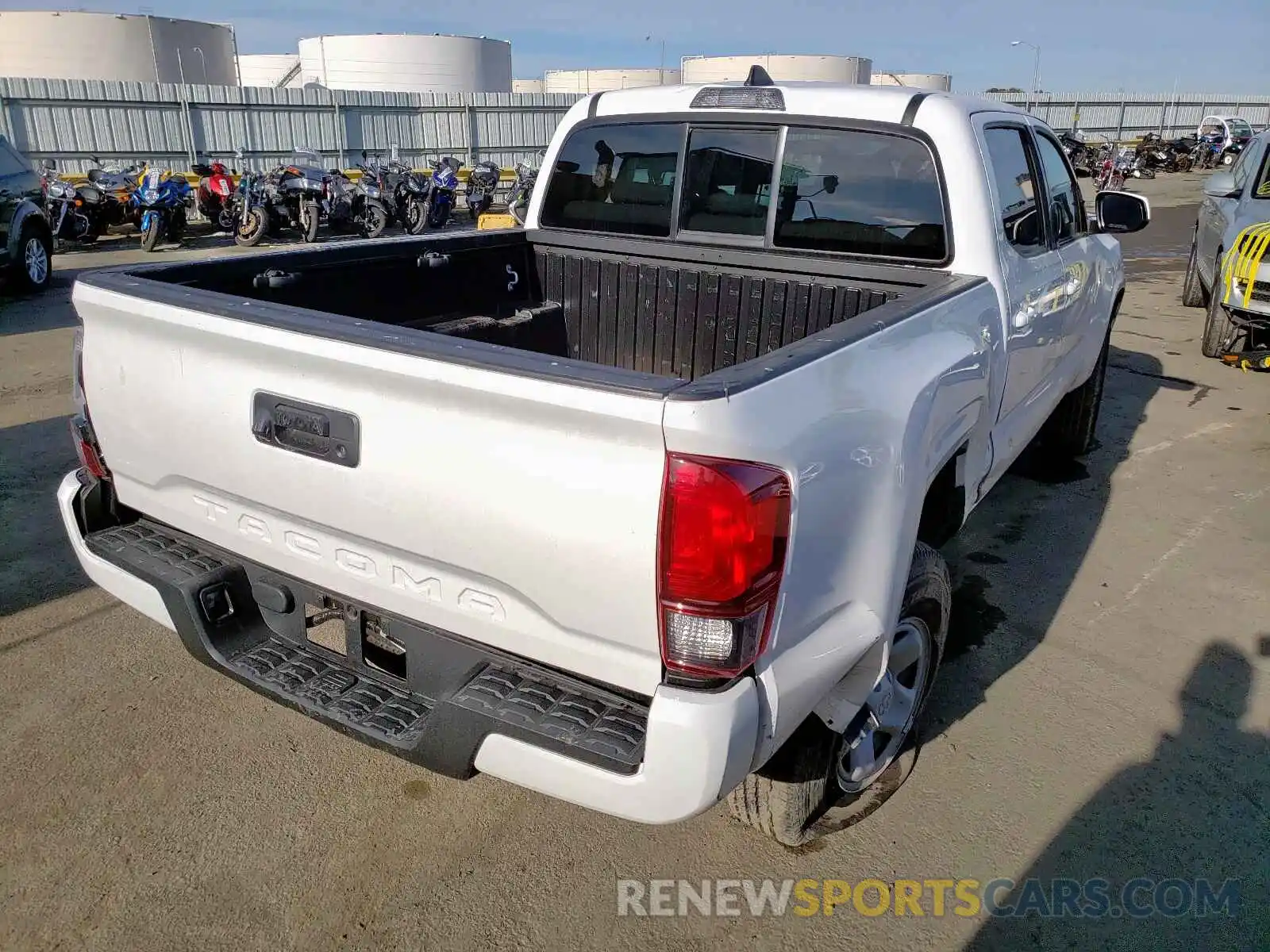 4 Photograph of a damaged car 5TFAX5GN8KX138474 TOYOTA TACOMA 2019