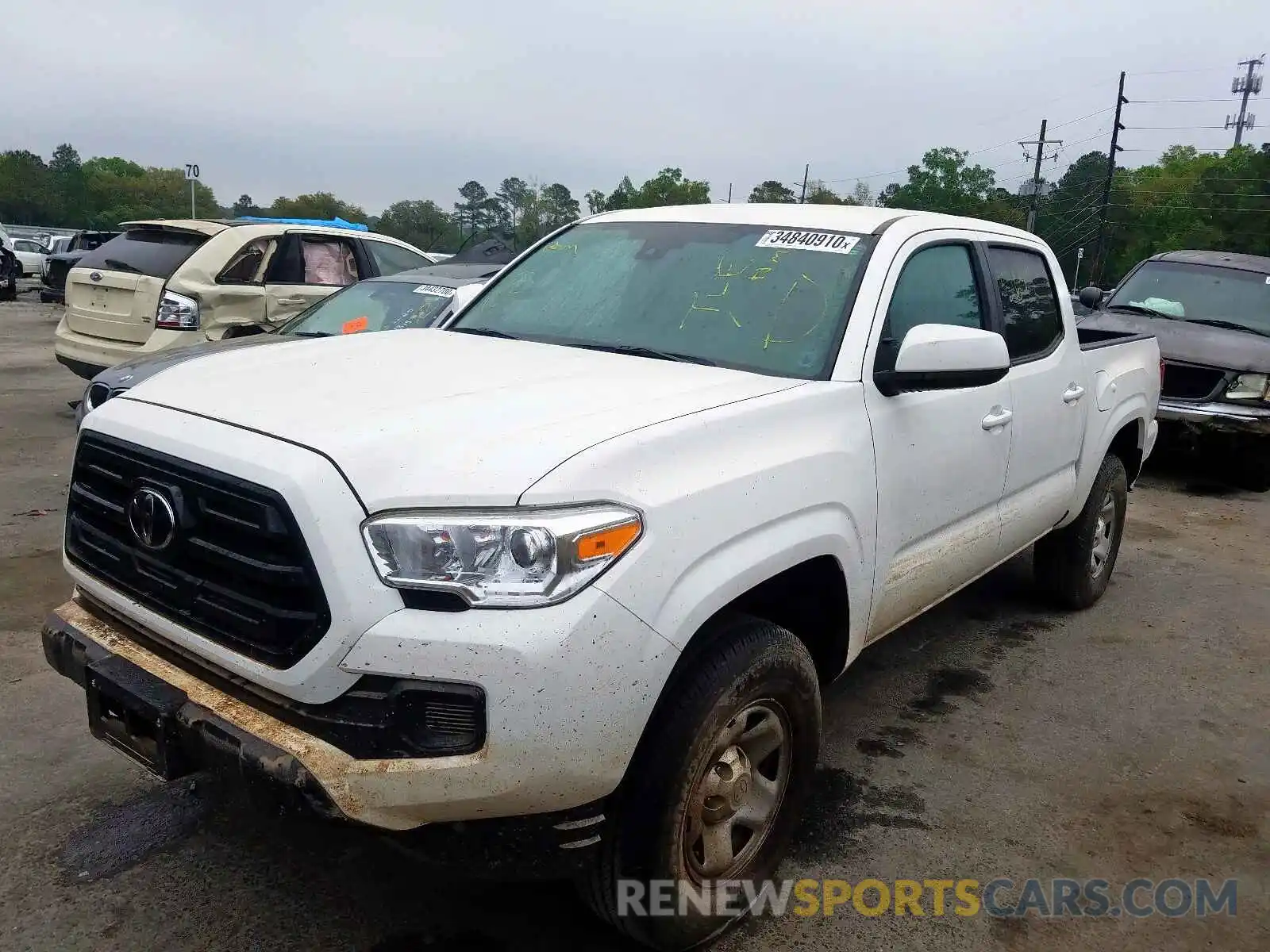 2 Photograph of a damaged car 5TFAX5GN8KX139754 TOYOTA TACOMA 2019