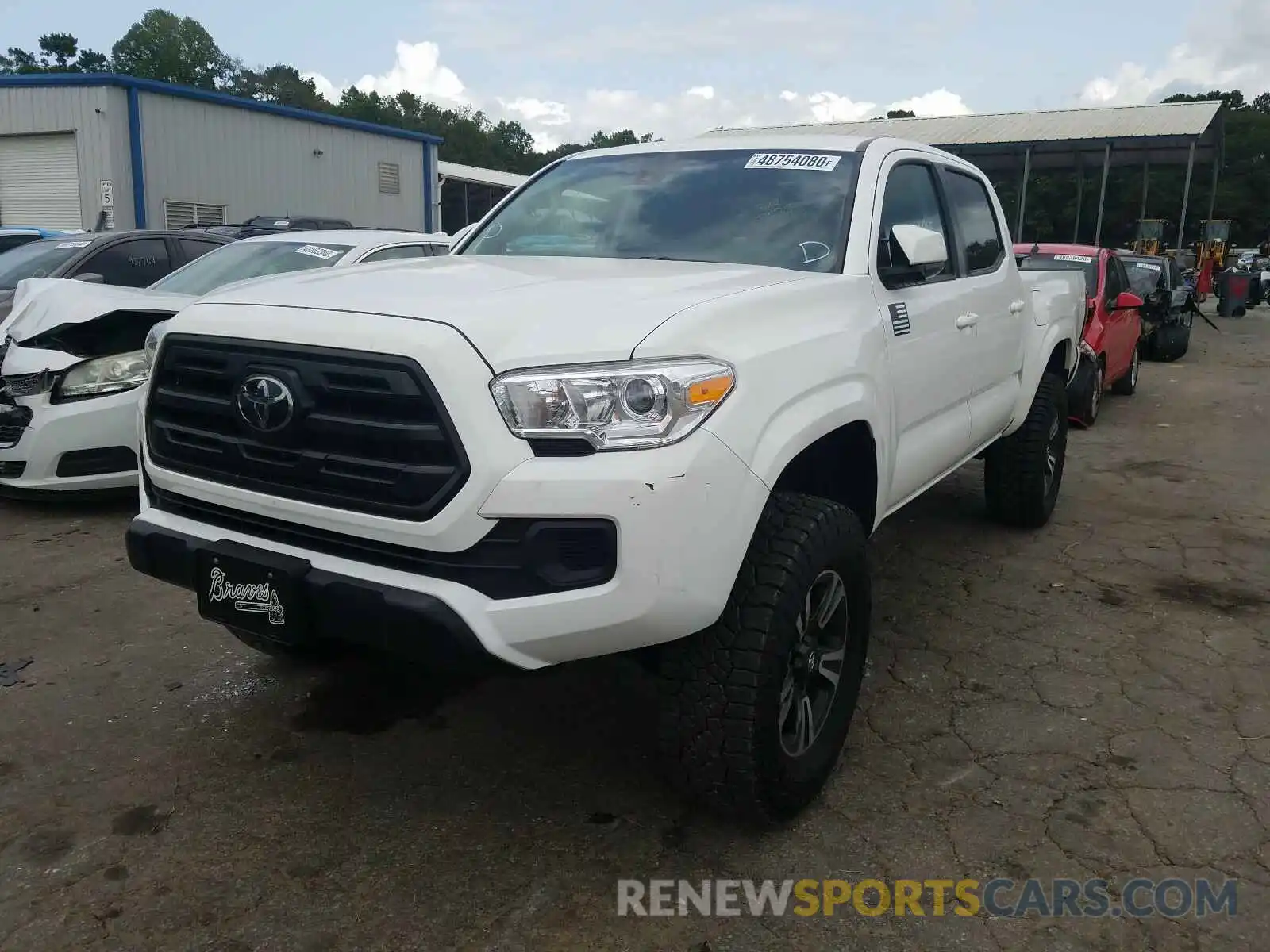 2 Photograph of a damaged car 5TFAX5GN8KX141410 TOYOTA TACOMA 2019