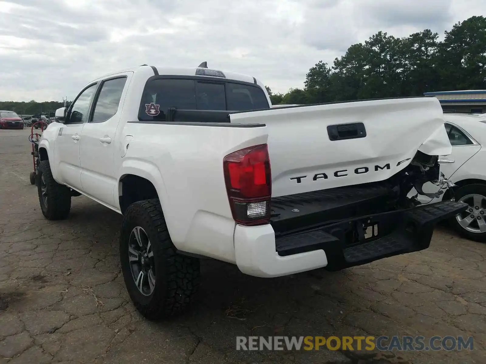 3 Photograph of a damaged car 5TFAX5GN8KX141410 TOYOTA TACOMA 2019