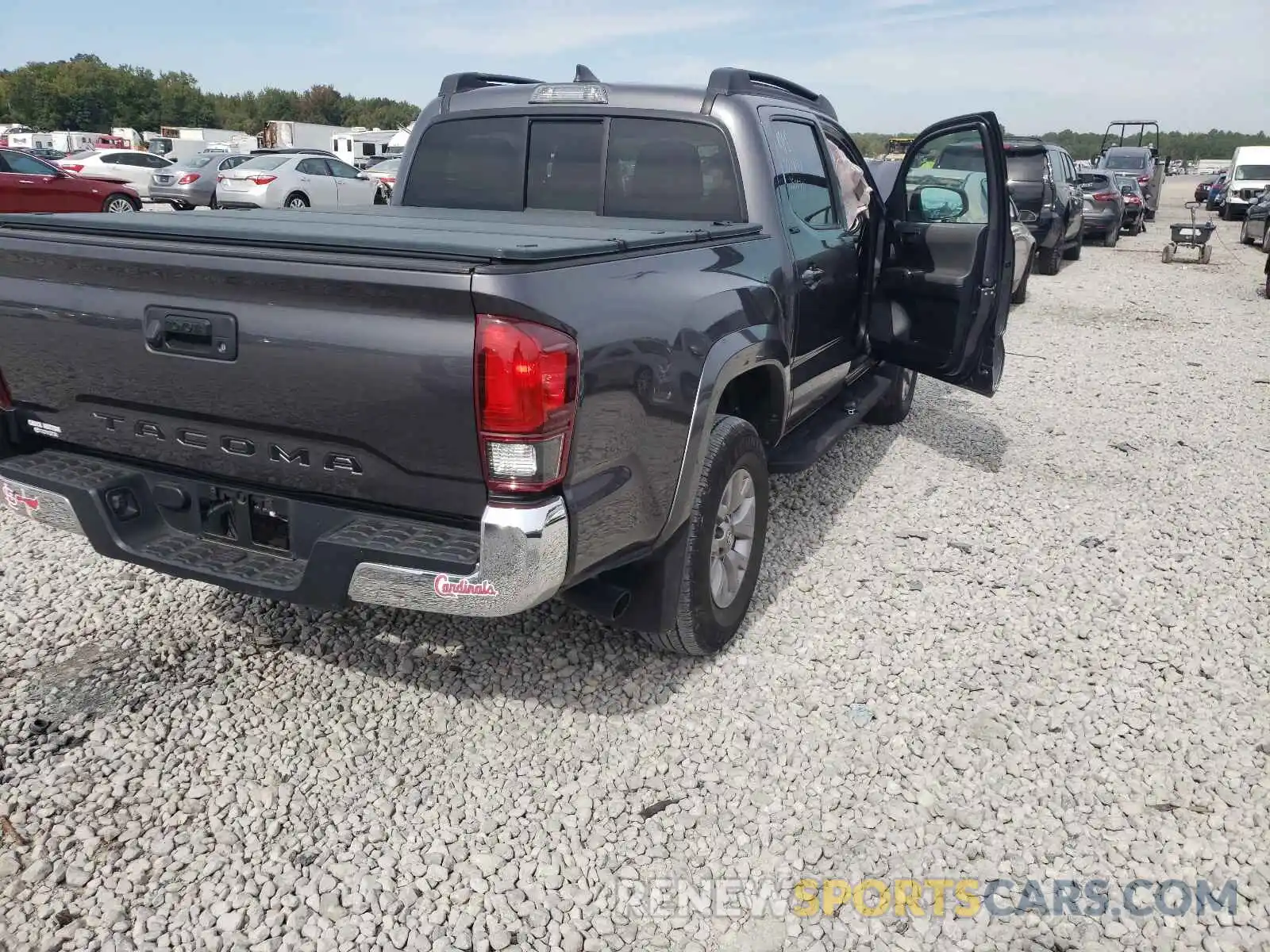 4 Photograph of a damaged car 5TFAX5GN8KX141844 TOYOTA TACOMA 2019