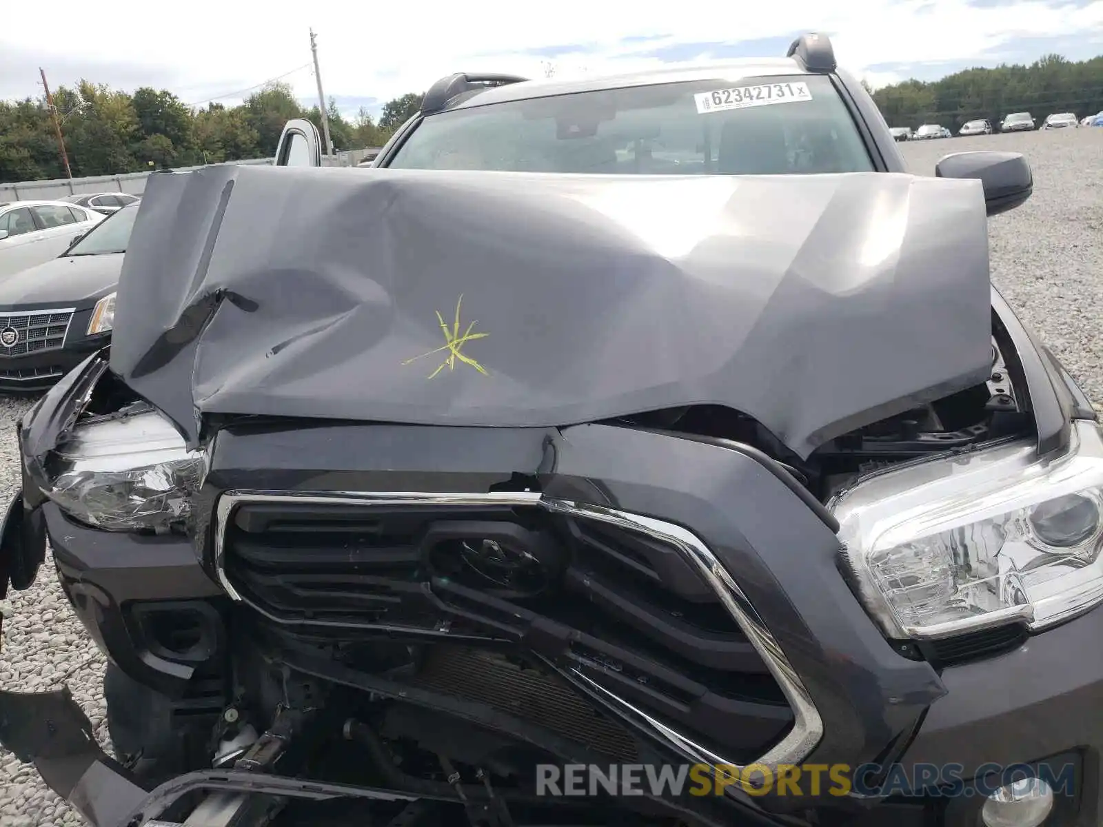 7 Photograph of a damaged car 5TFAX5GN8KX141844 TOYOTA TACOMA 2019