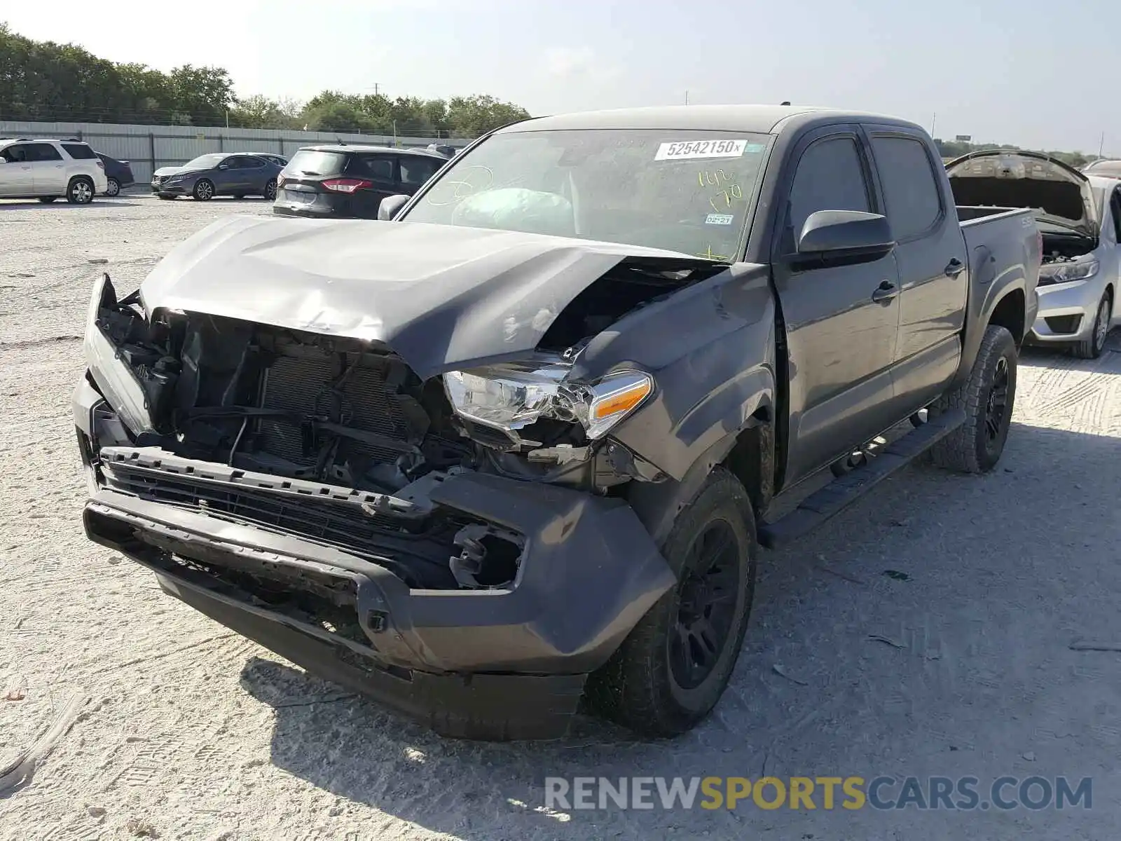 2 Photograph of a damaged car 5TFAX5GN8KX142170 TOYOTA TACOMA 2019