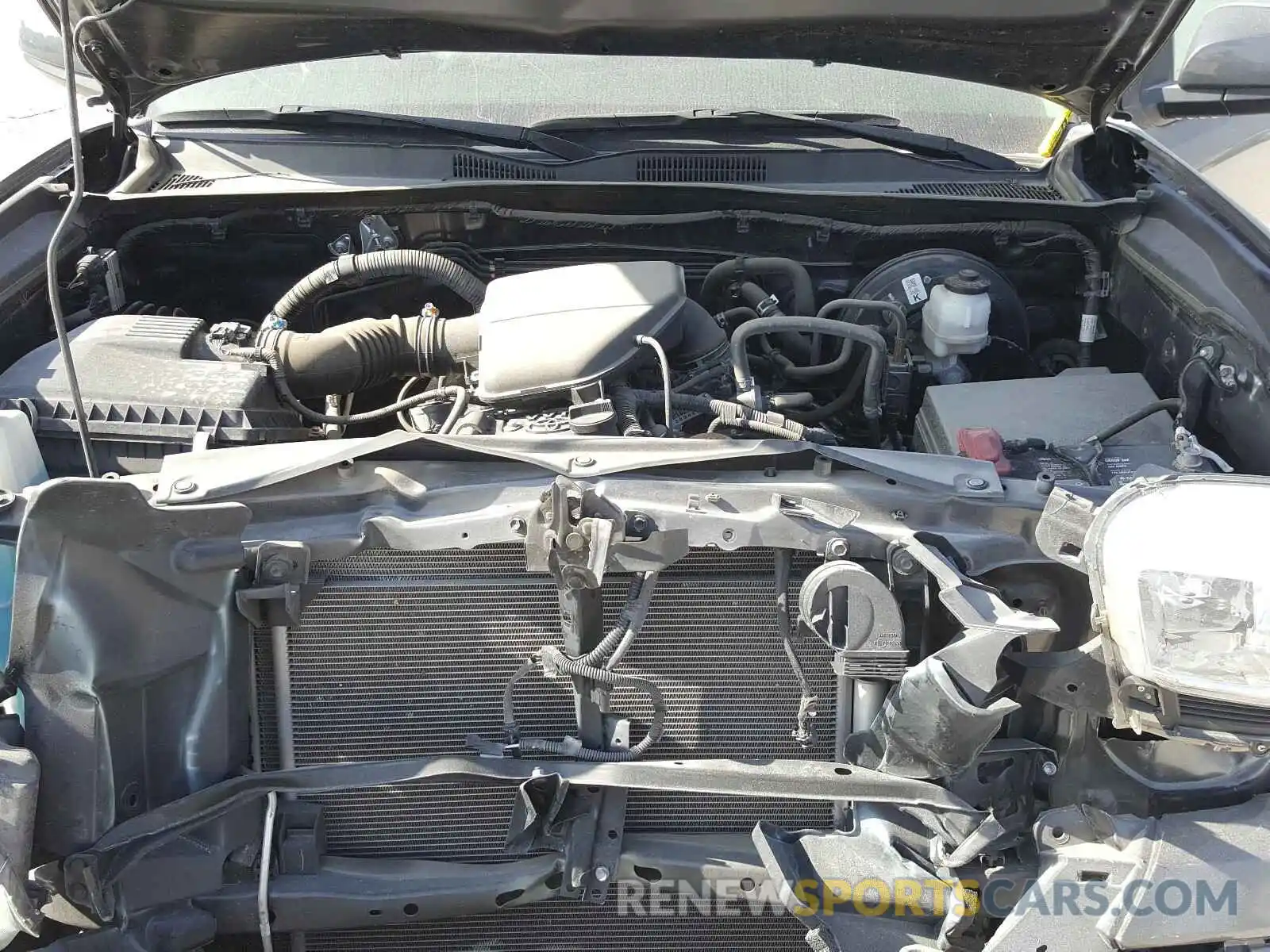 7 Photograph of a damaged car 5TFAX5GN8KX142170 TOYOTA TACOMA 2019