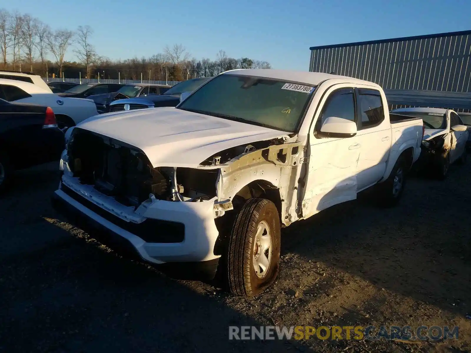 2 Photograph of a damaged car 5TFAX5GN8KX142556 TOYOTA TACOMA 2019