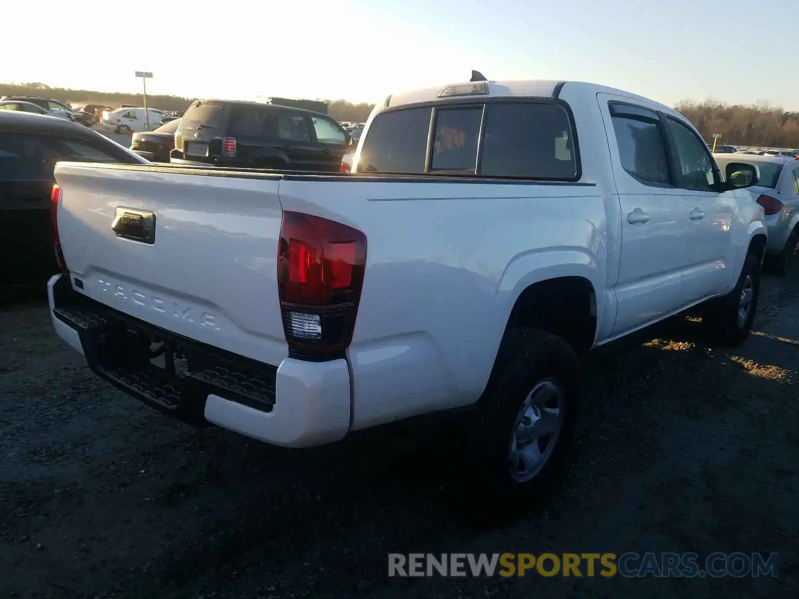 4 Photograph of a damaged car 5TFAX5GN8KX142556 TOYOTA TACOMA 2019